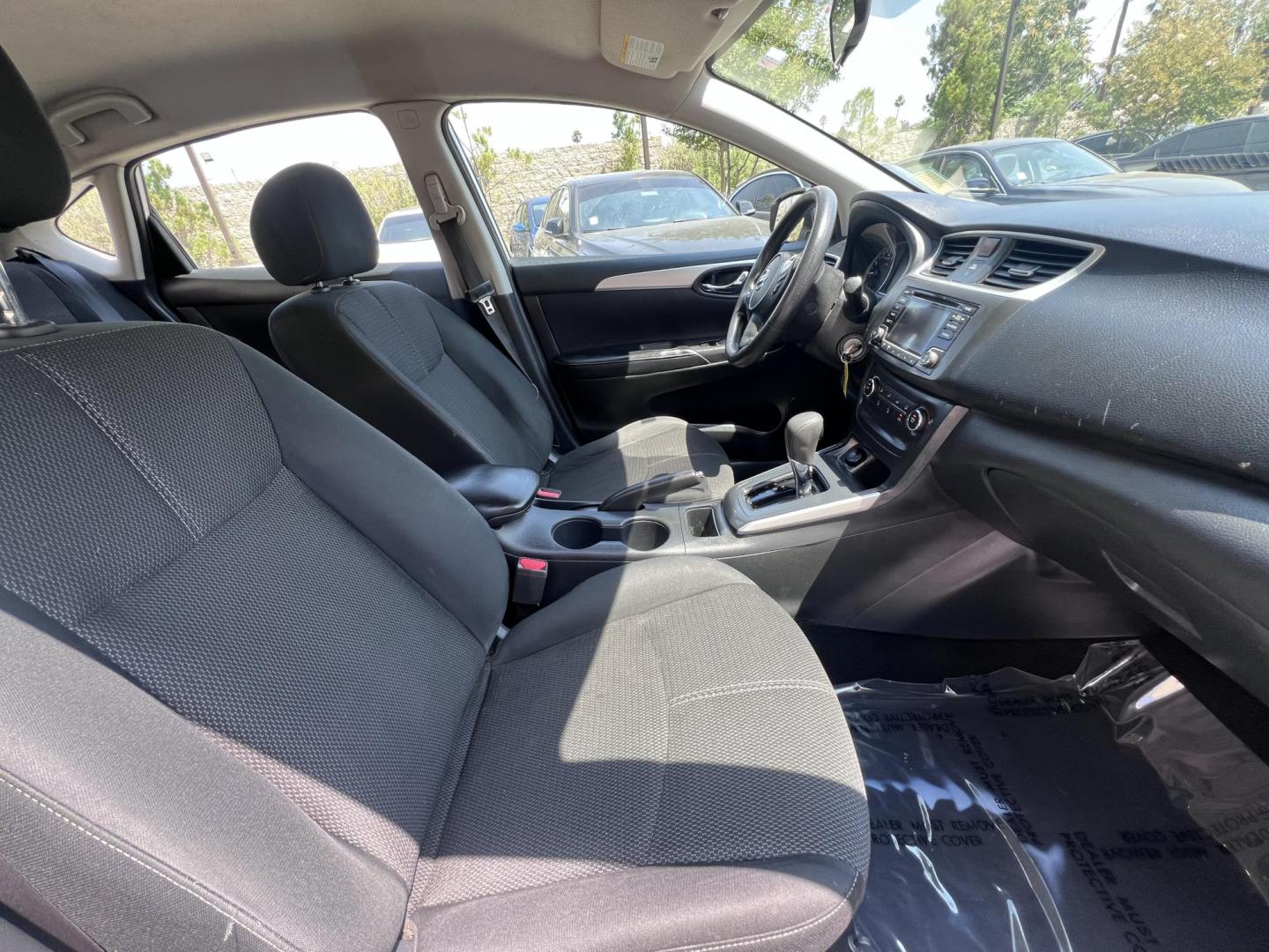2018 SILVER Nissan Sentra S CVT (3N1AB7AP0JY) with an 1.8L L4 SFI DOHC 16V engine, CVT transmission, located at 30 S. Berkeley Avenue, Pasadena, CA, 91107, (626) 248-7567, 34.145447, -118.109398 - Crown City Motors is a used “Buy Here Pay Here” car dealer in Pasadena CA. “Buy Here Pay Here” financing, means that when you purchase your vehicle from our dealership, that you make the payments to the dealership as well. We do not need the banks approval to get you approved for a used auto - Photo#16