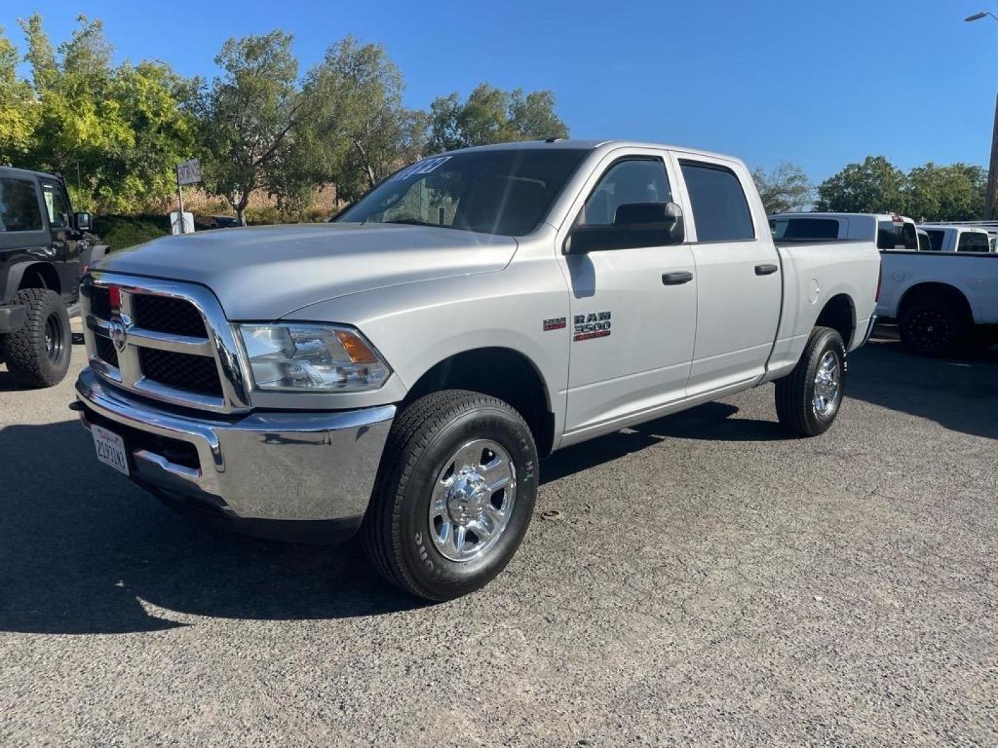 2018 Bright Silver Metallic Clear Coat RAM 3500 Tradesman (3C63R3CJ4JG) with an 6.4L HEMI 6.4L V8 410hp 429ft. lbs. Sequential Multiport Fuel Injection engine, 6-Speed Shiftable Automatic transmission, located at 800 Riverside Ave, Roseville, CA, 95678, 916-773-4549 & Toll Free: 866-719-4393, 38.732265, -121.291039 - CREW CAB 4X4 TRADESMAN 6.4 HEMI NEW TIRES CLEAN CARFAX - Photo#0
