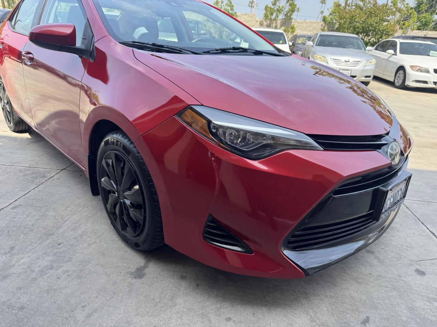 2018 Barcelona Red Metallic /Black Toyota Corolla XLE CVT (2T1BURHE4JC) with an 1.8L L4 DOHC 16V engine, CVT transmission, located at 30 S. Berkeley Avenue, Pasadena, CA, 91107, (626) 248-7567, 34.145447, -118.109398 - Affordable 2018 Toyota Corolla LE – Buy Here Pay Here in Pasadena – Bad Credit OK! Looking for a reliable and fuel-efficient car that won’t break the bank? Check out this 2018 Toyota Corolla LE in stunning Barcelona Red Metallic, now available at Crown City Motors in Pasadena, CA. This Coro - Photo#2