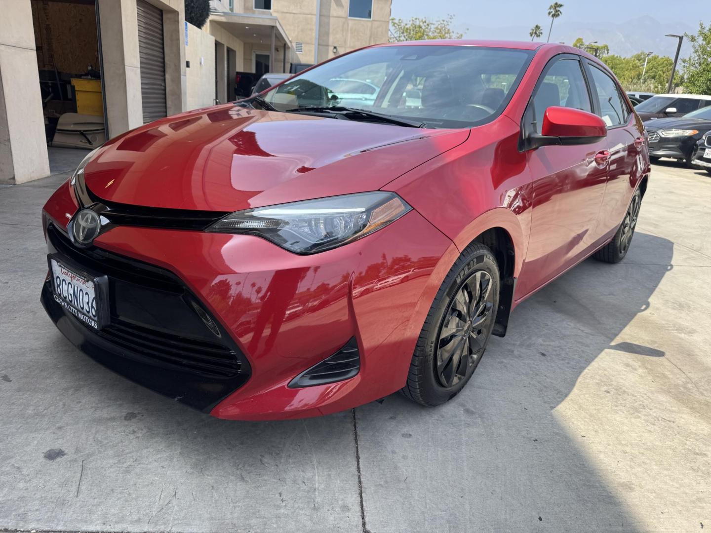 2018 Barcelona Red Metallic /Black Toyota Corolla XLE CVT (2T1BURHE4JC) with an 1.8L L4 DOHC 16V engine, CVT transmission, located at 30 S. Berkeley Avenue, Pasadena, CA, 91107, (626) 248-7567, 34.145447, -118.109398 - Affordable 2018 Toyota Corolla LE – Buy Here Pay Here in Pasadena – Bad Credit OK! Looking for a reliable and fuel-efficient car that won’t break the bank? Check out this 2018 Toyota Corolla LE in stunning Barcelona Red Metallic, now available at Crown City Motors in Pasadena, CA. This Coro - Photo#0