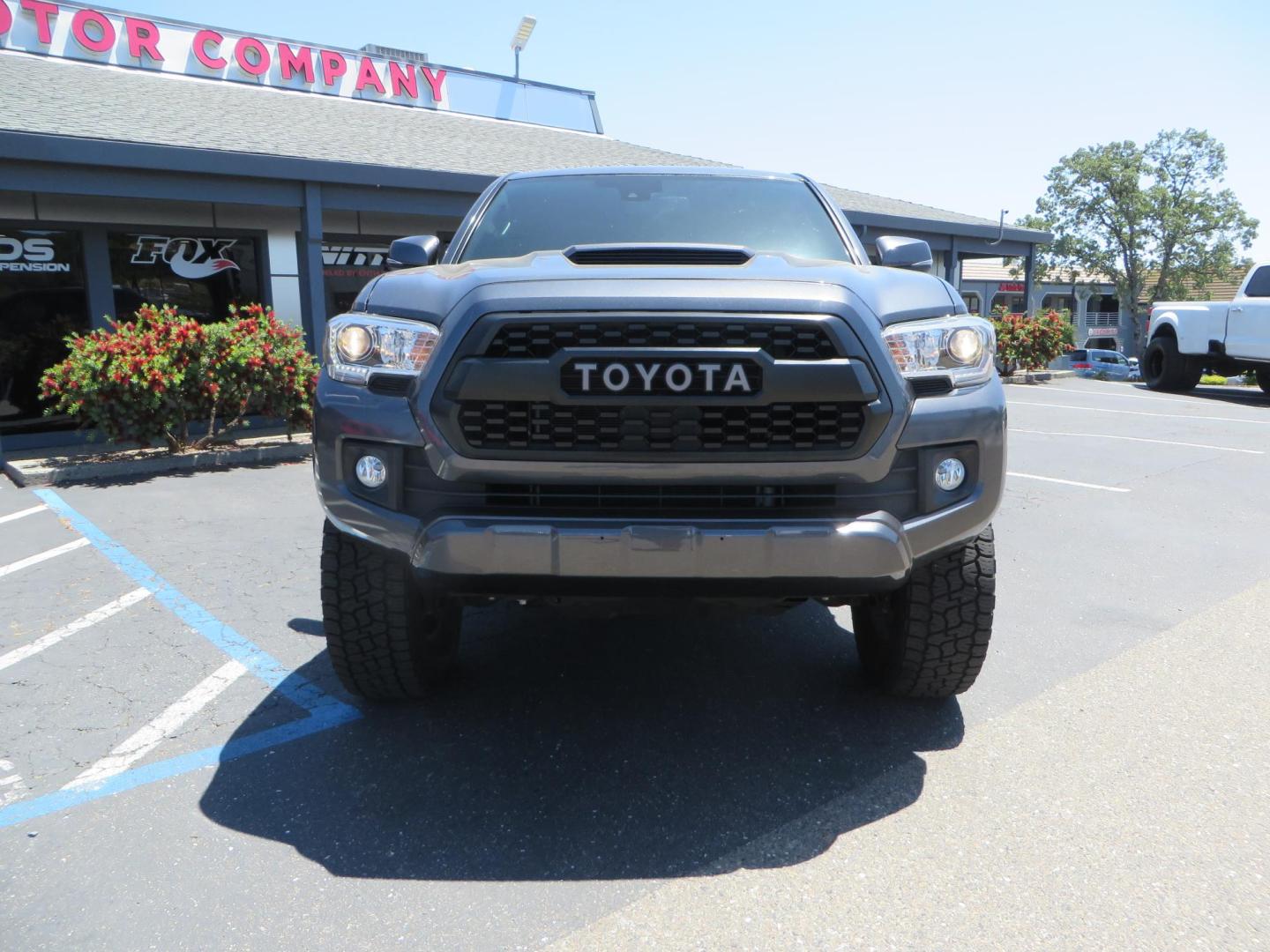2018 CHARCOAL Toyota Tacoma TRD Sport Double Cab V6 6AT 4WD (3TMCZ5AN1JM) with an 3.6L V6 DOHC 24V engine, 6A transmission, located at 2630 Grass Valley Highway, Auburn, CA, 95603, (530) 508-5100, 38.937893, -121.095482 - Features a level kit, Nitto Terra Grappler G3 tires, TRD exhaust, and window tint. - Photo#1
