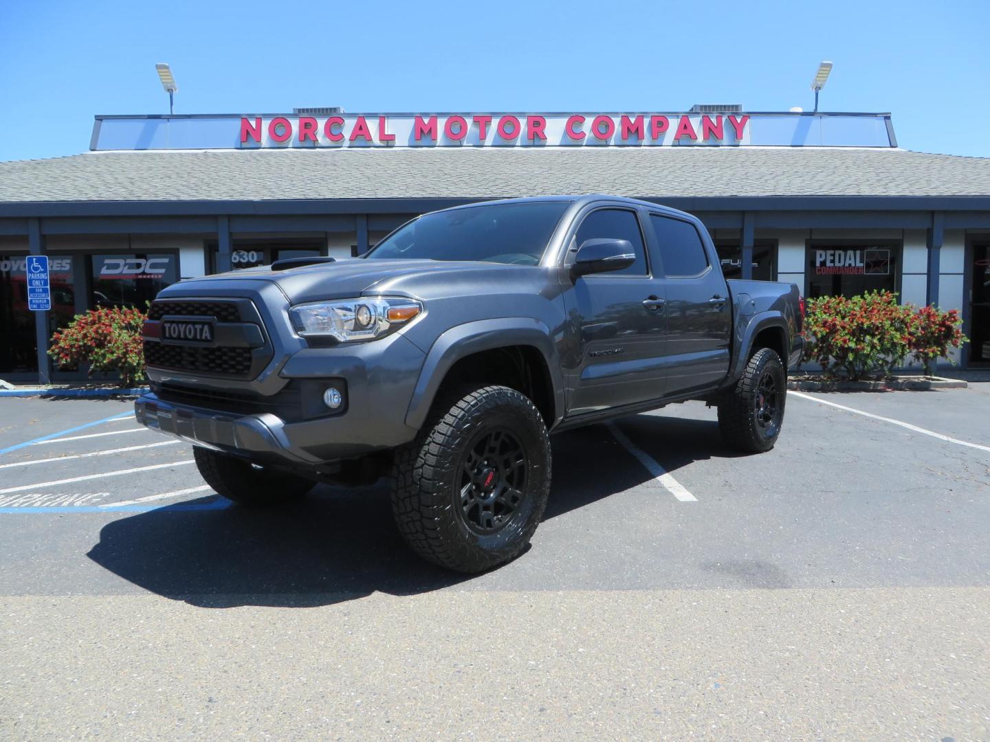2018 CHARCOAL Toyota Tacoma TRD Sport Double Cab V6 6AT 4WD (3TMCZ5AN1JM) with an 3.6L V6 DOHC 24V engine, 6A transmission, located at 2630 Grass Valley Highway, Auburn, CA, 95603, (530) 508-5100, 38.937893, -121.095482 - Features a level kit, Nitto Terra Grappler G3 tires, TRD exhaust, and window tint. - Photo#0