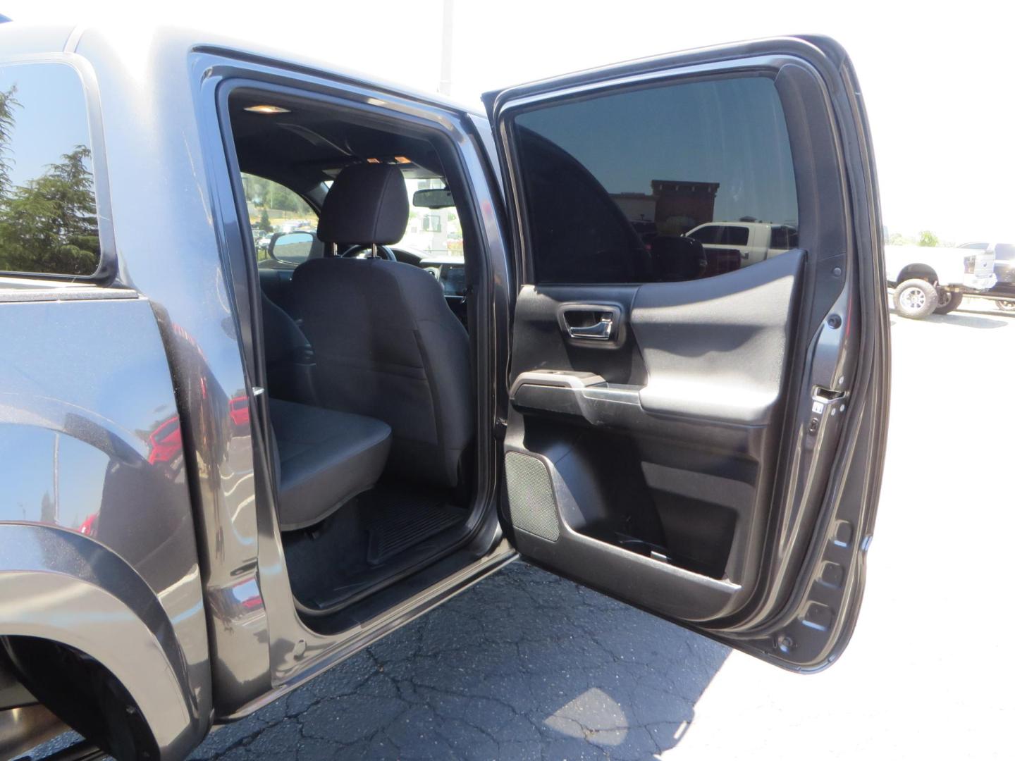 2018 CHARCOAL Toyota Tacoma TRD Sport Double Cab V6 6AT 4WD (3TMCZ5AN1JM) with an 3.6L V6 DOHC 24V engine, 6A transmission, located at 2630 Grass Valley Highway, Auburn, CA, 95603, (530) 508-5100, 38.937893, -121.095482 - Features a level kit, Nitto Terra Grappler G3 tires, TRD exhaust, and window tint. - Photo#47