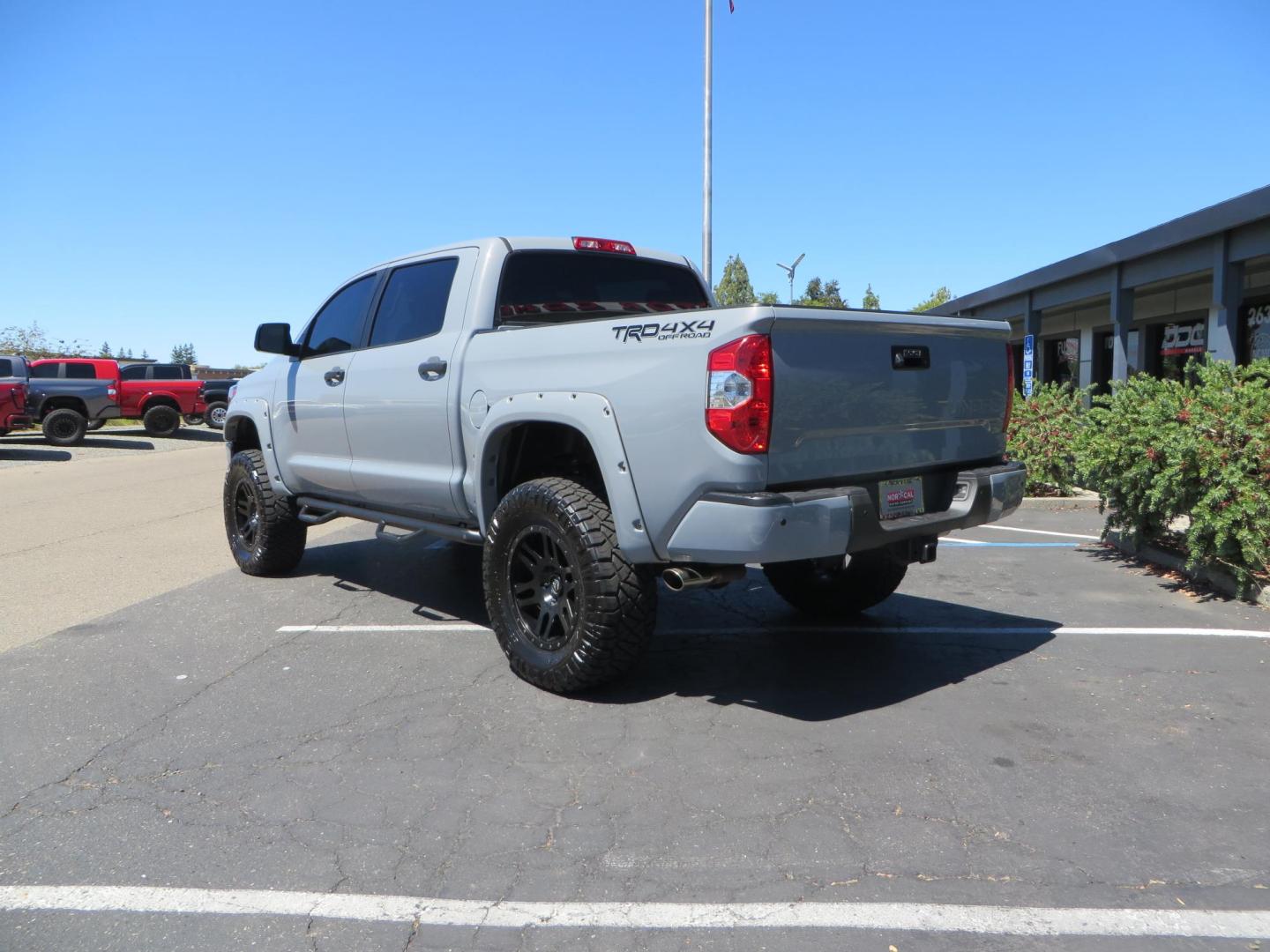 2018 Gray /Black Toyota Tundra SR5 5.7L V8 CrewMax 4WD (5TFDY5F15JX) with an 5.7L V8 DOHC 32V engine, 6A transmission, located at 2630 Grass Valley Highway, Auburn, CA, 95603, (530) 508-5100, 38.937893, -121.095482 - Lifted Tundra sitting on a Pro Comp 6" Lift kit, 37" Nitto Ridge Grappler tires, 20" Fuel Recoil wheels, N-Fab running boards, Grille Mounted Light Bar, Bilstein 5100 rear shocks, TRD dual exhaust, Fender Flares, and window tint. - Photo#2