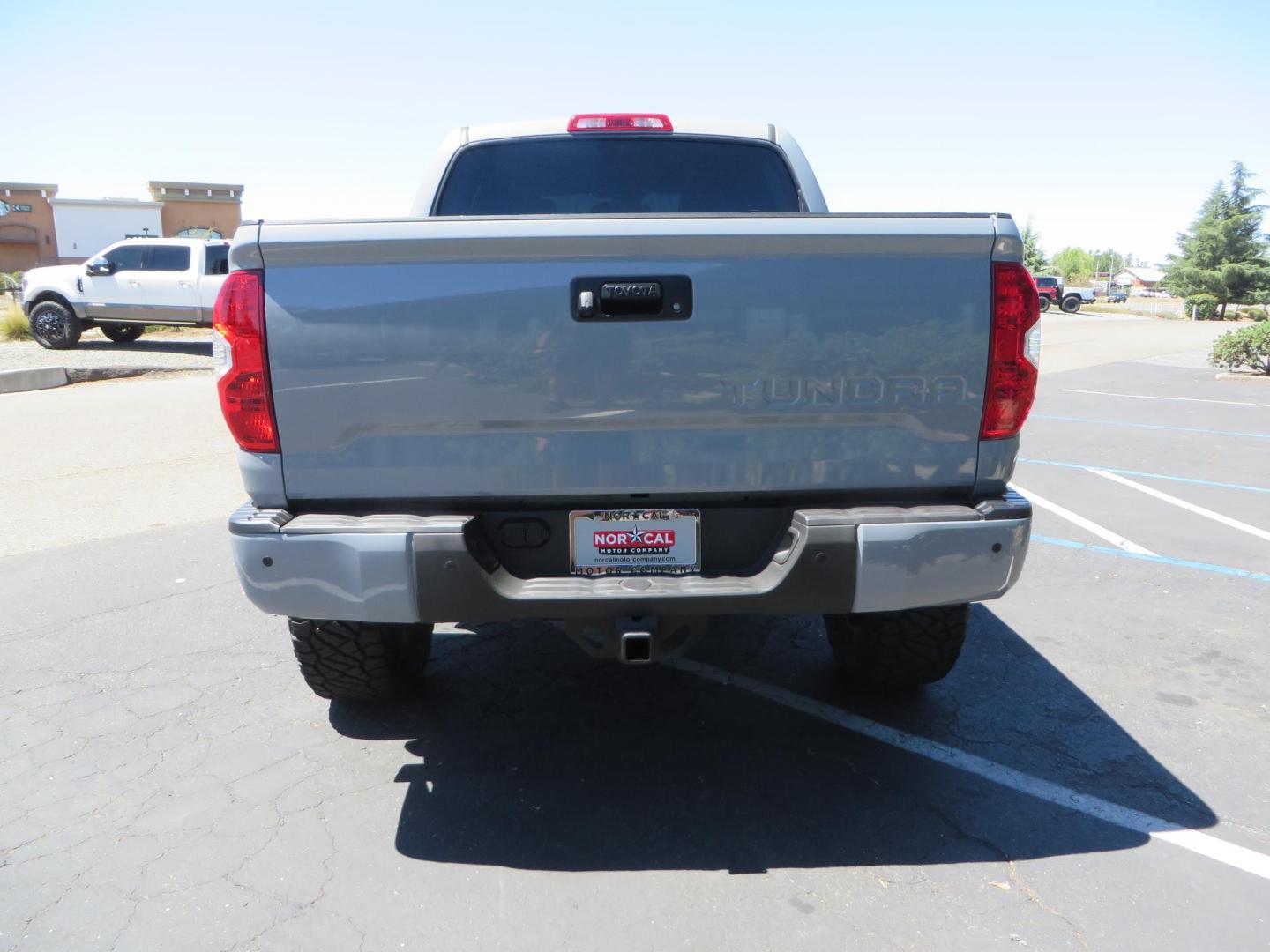 2018 Gray /Black Toyota Tundra SR5 5.7L V8 CrewMax 4WD (5TFDY5F15JX) with an 5.7L V8 DOHC 32V engine, 6A transmission, located at 2630 Grass Valley Highway, Auburn, CA, 95603, (530) 508-5100, 38.937893, -121.095482 - Lifted Tundra sitting on a Pro Comp 6" Lift kit, 37" Nitto Ridge Grappler tires, 20" Fuel Recoil wheels, N-Fab running boards, Grille Mounted Light Bar, Bilstein 5100 rear shocks, TRD dual exhaust, Fender Flares, and window tint. - Photo#3