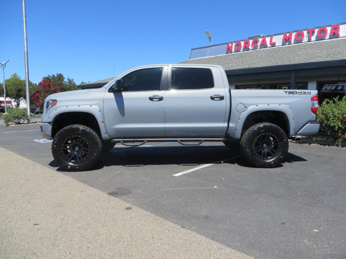 2018 Gray /Black Toyota Tundra SR5 5.7L V8 CrewMax 4WD (5TFDY5F15JX) with an 5.7L V8 DOHC 32V engine, 6A transmission, located at 2630 Grass Valley Highway, Auburn, CA, 95603, (530) 508-5100, 38.937893, -121.095482 - Lifted Tundra sitting on a Pro Comp 6" Lift kit, 37" Nitto Ridge Grappler tires, 20" Fuel Recoil wheels, N-Fab running boards, Grille Mounted Light Bar, Bilstein 5100 rear shocks, TRD dual exhaust, Fender Flares, and window tint. - Photo#1