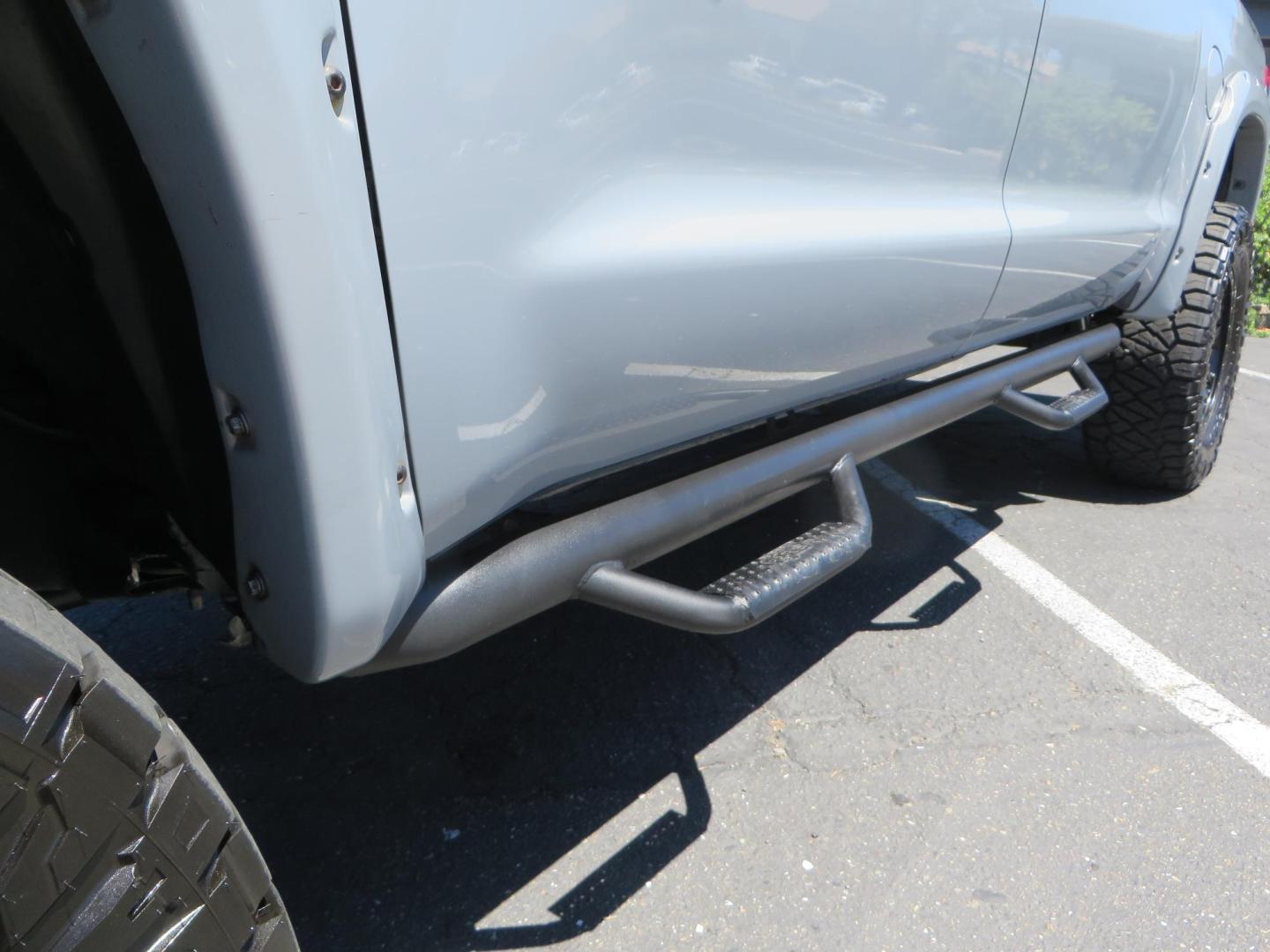 2018 Gray /Black Toyota Tundra SR5 5.7L V8 CrewMax 4WD (5TFDY5F15JX) with an 5.7L V8 DOHC 32V engine, 6A transmission, located at 2630 Grass Valley Highway, Auburn, CA, 95603, (530) 508-5100, 38.937893, -121.095482 - Lifted Tundra sitting on a Pro Comp 6" Lift kit, 37" Nitto Ridge Grappler tires, 20" Fuel Recoil wheels, N-Fab running boards, Grille Mounted Light Bar, Bilstein 5100 rear shocks, TRD dual exhaust, Fender Flares, and window tint. - Photo#10