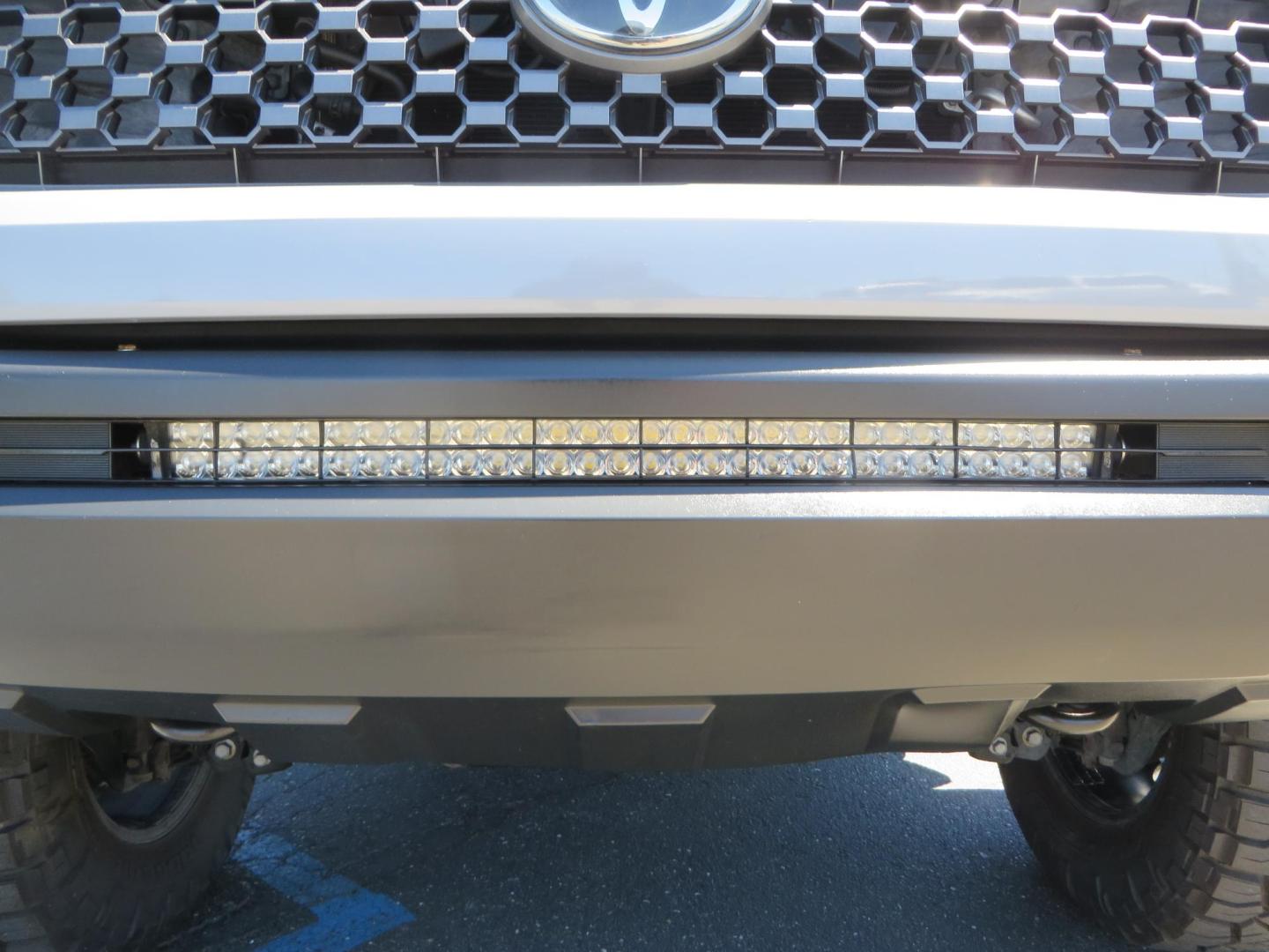 2018 Gray /Black Toyota Tundra SR5 5.7L V8 CrewMax 4WD (5TFDY5F15JX) with an 5.7L V8 DOHC 32V engine, 6A transmission, located at 2630 Grass Valley Highway, Auburn, CA, 95603, (530) 508-5100, 38.937893, -121.095482 - Lifted Tundra sitting on a Pro Comp 6" Lift kit, 37" Nitto Ridge Grappler tires, 20" Fuel Recoil wheels, N-Fab running boards, Grille Mounted Light Bar, Bilstein 5100 rear shocks, TRD dual exhaust, Fender Flares, and window tint. - Photo#12