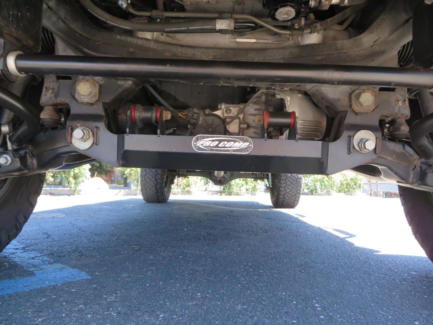 2018 Gray /Black Toyota Tundra SR5 5.7L V8 CrewMax 4WD (5TFDY5F15JX) with an 5.7L V8 DOHC 32V engine, 6A transmission, located at 2630 Grass Valley Highway, Auburn, CA, 95603, (530) 508-5100, 38.937893, -121.095482 - Lifted Tundra sitting on a Pro Comp 6" Lift kit, 37" Nitto Ridge Grappler tires, 20" Fuel Recoil wheels, N-Fab running boards, Grille Mounted Light Bar, Bilstein 5100 rear shocks, TRD dual exhaust, Fender Flares, and window tint. - Photo#11