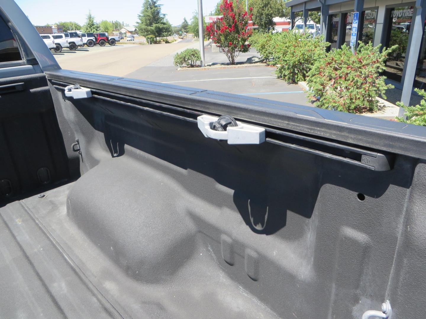 2018 Gray /Black Toyota Tundra SR5 5.7L V8 CrewMax 4WD (5TFDY5F15JX) with an 5.7L V8 DOHC 32V engine, 6A transmission, located at 2630 Grass Valley Highway, Auburn, CA, 95603, (530) 508-5100, 38.937893, -121.095482 - Lifted Tundra sitting on a Pro Comp 6" Lift kit, 37" Nitto Ridge Grappler tires, 20" Fuel Recoil wheels, N-Fab running boards, Grille Mounted Light Bar, Bilstein 5100 rear shocks, TRD dual exhaust, Fender Flares, and window tint. - Photo#15