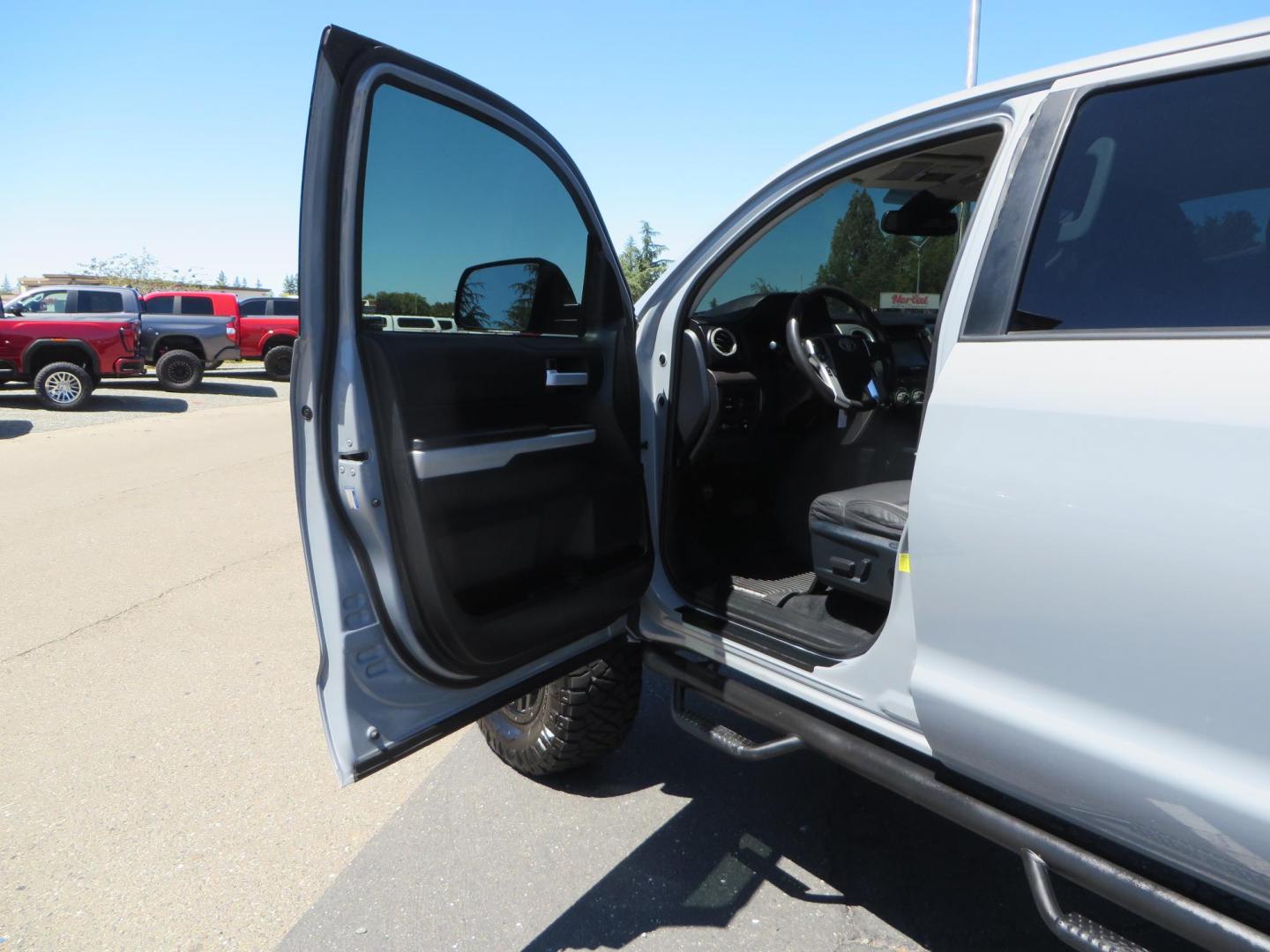 2018 Gray /Black Toyota Tundra SR5 5.7L V8 CrewMax 4WD (5TFDY5F15JX) with an 5.7L V8 DOHC 32V engine, 6A transmission, located at 2630 Grass Valley Highway, Auburn, CA, 95603, (530) 508-5100, 38.937893, -121.095482 - Lifted Tundra sitting on a Pro Comp 6" Lift kit, 37" Nitto Ridge Grappler tires, 20" Fuel Recoil wheels, N-Fab running boards, Grille Mounted Light Bar, Bilstein 5100 rear shocks, TRD dual exhaust, Fender Flares, and window tint. - Photo#16