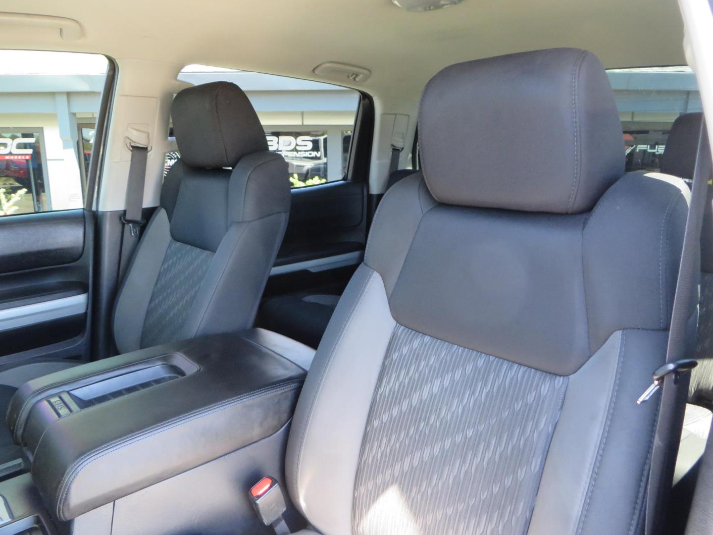 2018 Gray /Black Toyota Tundra SR5 5.7L V8 CrewMax 4WD (5TFDY5F15JX) with an 5.7L V8 DOHC 32V engine, 6A transmission, located at 2630 Grass Valley Highway, Auburn, CA, 95603, (530) 508-5100, 38.937893, -121.095482 - Lifted Tundra sitting on a Pro Comp 6" Lift kit, 37" Nitto Ridge Grappler tires, 20" Fuel Recoil wheels, N-Fab running boards, Grille Mounted Light Bar, Bilstein 5100 rear shocks, TRD dual exhaust, Fender Flares, and window tint. - Photo#20
