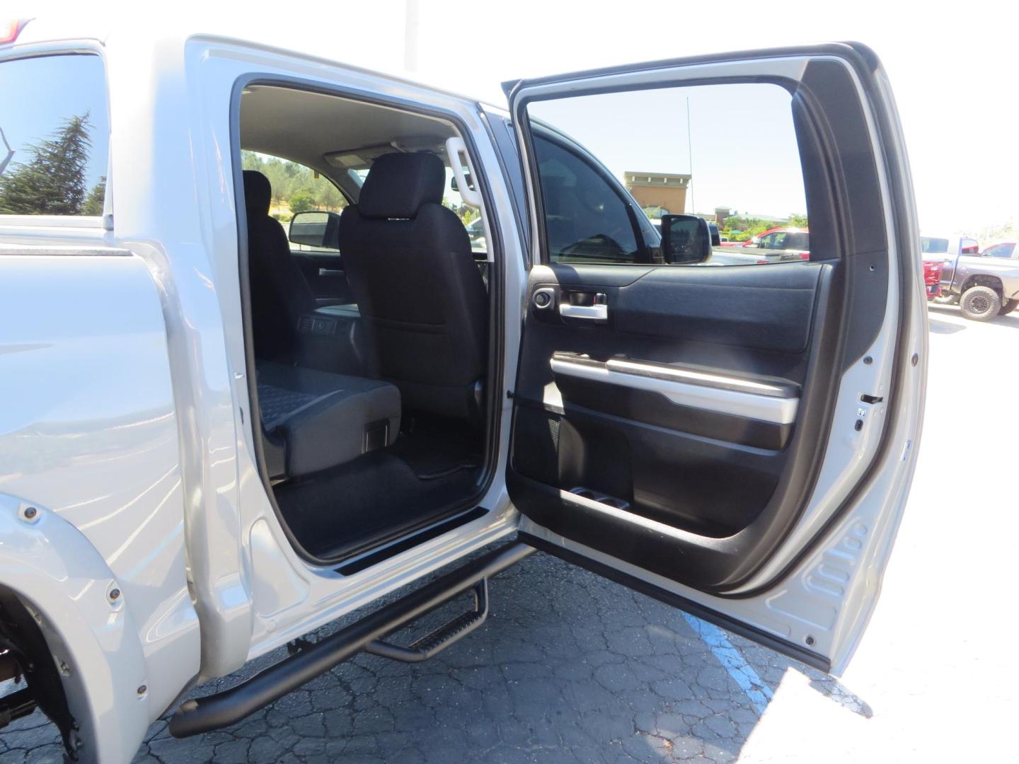 2018 Gray /Black Toyota Tundra SR5 5.7L V8 CrewMax 4WD (5TFDY5F15JX) with an 5.7L V8 DOHC 32V engine, 6A transmission, located at 2630 Grass Valley Highway, Auburn, CA, 95603, (530) 508-5100, 38.937893, -121.095482 - Lifted Tundra sitting on a Pro Comp 6" Lift kit, 37" Nitto Ridge Grappler tires, 20" Fuel Recoil wheels, N-Fab running boards, Grille Mounted Light Bar, Bilstein 5100 rear shocks, TRD dual exhaust, Fender Flares, and window tint. - Photo#49