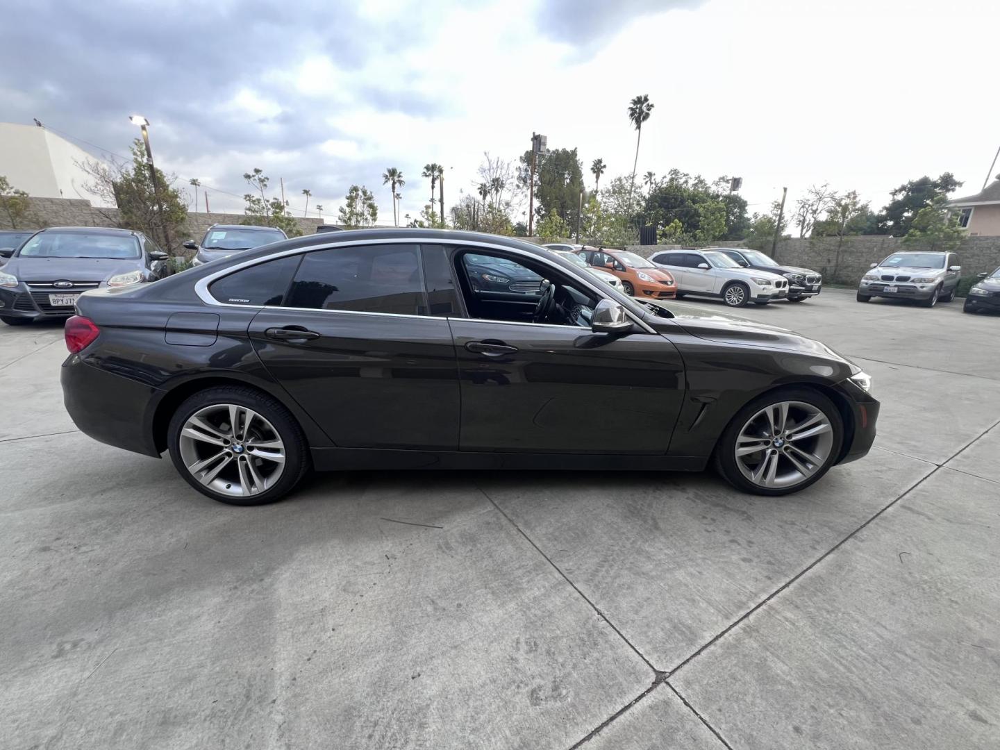 2019 Mineral Grey Metallic /Black BMW 4-Series 430i (WBA4J1C51KB) with an 2.0L L4 DOHC 16V engine, 8A transmission, located at 30 S. Berkeley Avenue, Pasadena, CA, 91107, (626) 248-7567, 34.145447, -118.109398 - Searching for a stylish yet practical luxury car? Look no further than this 2019 BMW 4-Series Gran Coupe 430i, now available at Crown City Motors of Pasadena. As a leading Buy Here Pay Here dealer, we specialize in bad credit used car financing, making it simple for drivers in Pasadena and beyond to - Photo#4