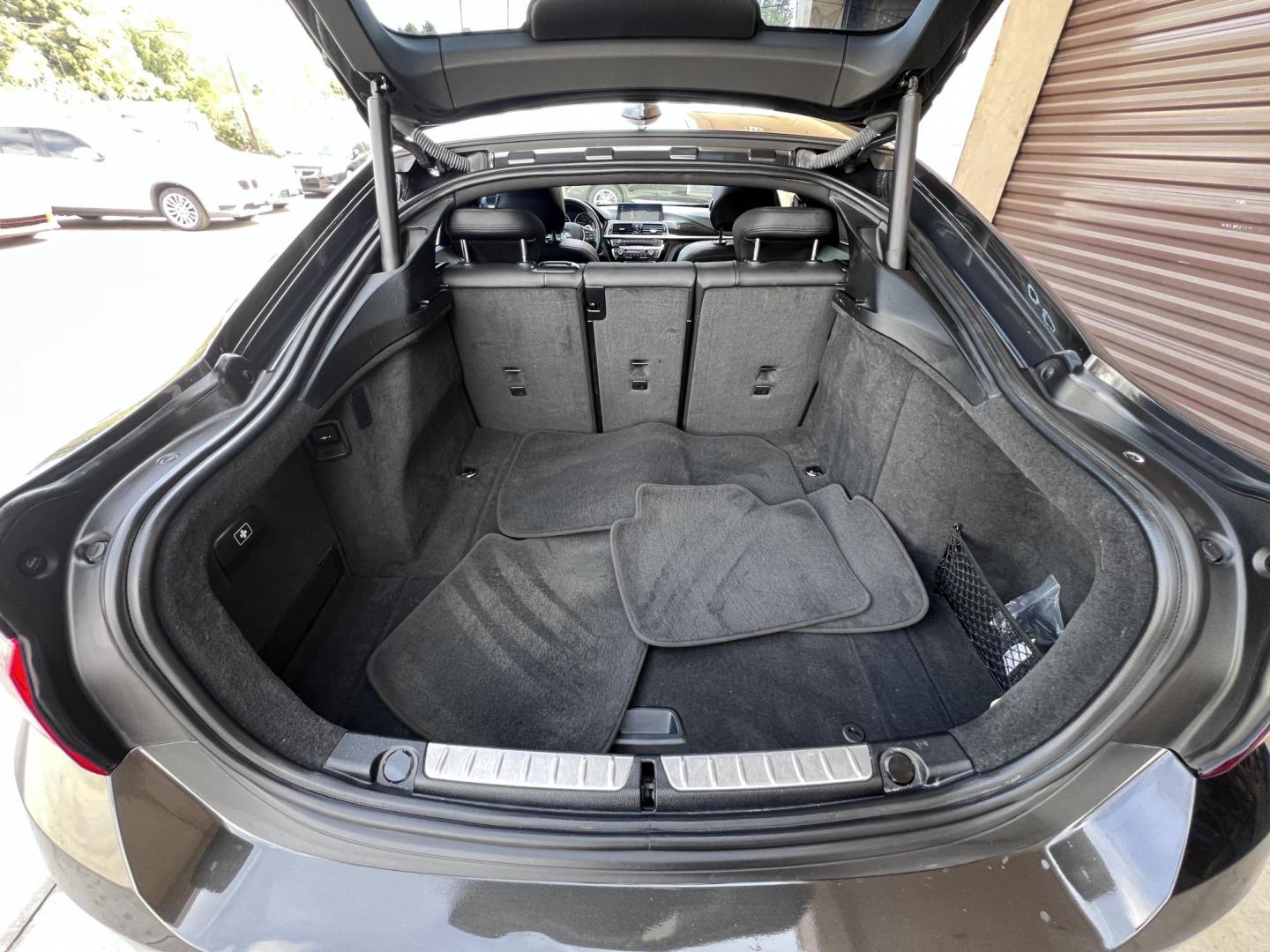2019 Mineral Grey Metallic /Black BMW 4-Series 430i (WBA4J1C51KB) with an 2.0L L4 DOHC 16V engine, 8A transmission, located at 30 S. Berkeley Avenue, Pasadena, CA, 91107, (626) 248-7567, 34.145447, -118.109398 - Searching for a stylish yet practical luxury car? Look no further than this 2019 BMW 4-Series Gran Coupe 430i, now available at Crown City Motors of Pasadena. As a leading Buy Here Pay Here dealer, we specialize in bad credit used car financing, making it simple for drivers in Pasadena and beyond to - Photo#32