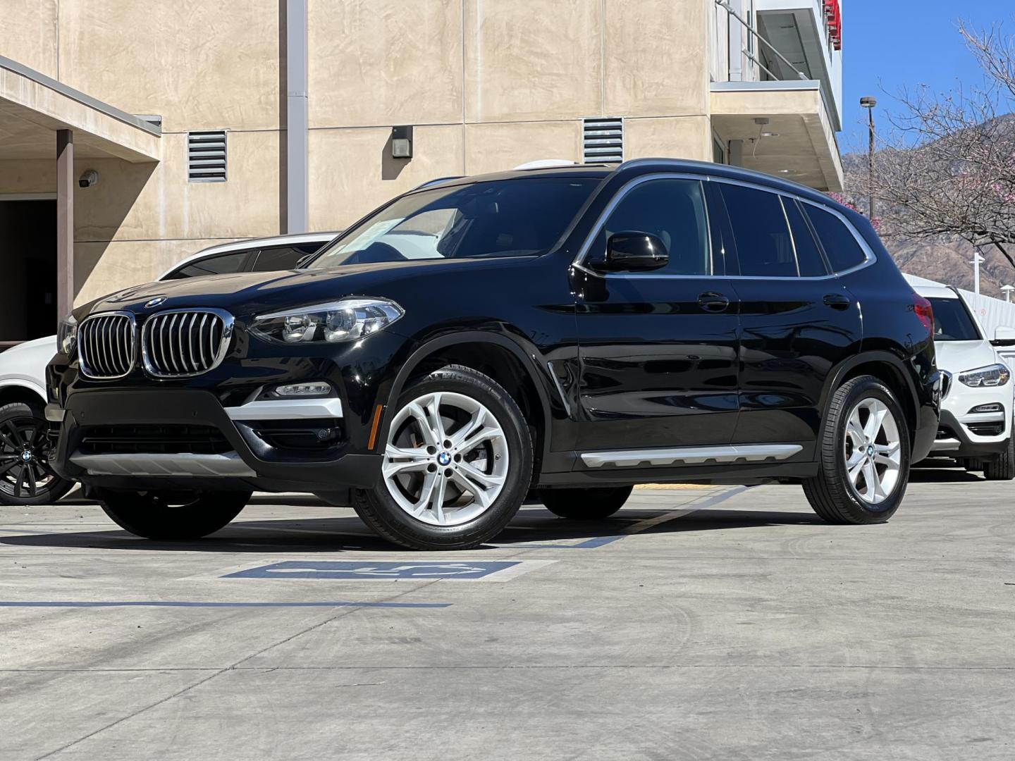 2019 Black /Black BMW X3 xDrive30i (5UXTR7C55KL) with an 2.0L L4 DOHC 16V engine, 8A transmission, located at 30 S. Berkeley Avenue, Pasadena, CA, 91107, (626) 248-7567, 34.145447, -118.109398 - Ready to elevate your drive with a modern luxury SUV? Discover this stunning 2019 BMW X3, available now at Crown City Motors of Pasadena. As a premier Buy Here Pay Here dealer, we specialize in bad credit used car financing, ensuring that even if your credit isn’t perfect, you can still take home - Photo#0