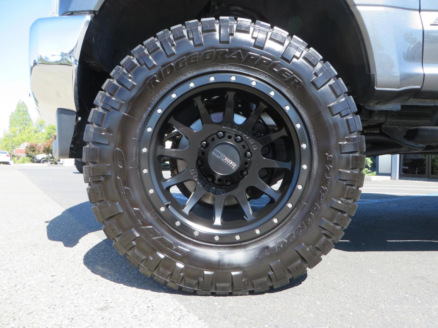 2019 Charcoal /BLACK Ford F250 Super Duty Crew Cab Lariat Crew Cab 4WD (1FT7W2BT0KE) with an V8 Turbo Diesel 6.7 Liter engine, Automatic 6-Spd w/SelectShift and TorqShift-G transmission, located at 2630 Grass Valley Highway, Auburn, CA, 95603, (530) 508-5100, 38.937893, -121.095482 - Features - BDS 4" radius arm suspension system, Fox 2.0 shocks, 37" NItto Ridge Grappler tires, 20" Method NV wheels, and window tint. - Photo#9
