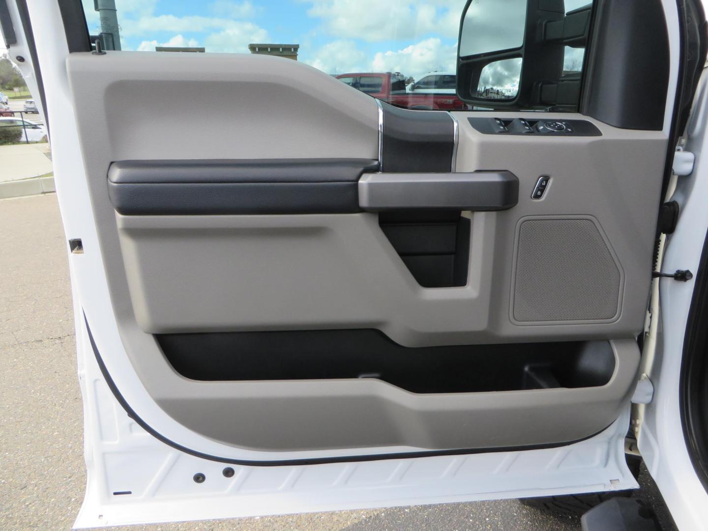 2019 White Ford F-250 SD XLT Crew Cab Short Bed 4WD (1FT7W2BT9KE) with an 6.7L V8 OHV 16V DIESEL engine, 6A transmission, located at 2630 Grass Valley Highway, Auburn, CA, 95603, (530) 508-5100, 38.937893, -121.095482 - Leveled XLT sitting on 22" SOTA Novakane wheels, 325 Nitto Ridge Grappler tires, Fox Shocks and dual steering stabilizers, Firestone Ride Rite air bags, Airlift wireless 1 air compressor, B and W Turnover gooseneck hitch, Weathertech floor liners, Deezee tailgate assist, and window tint. - Photo#20