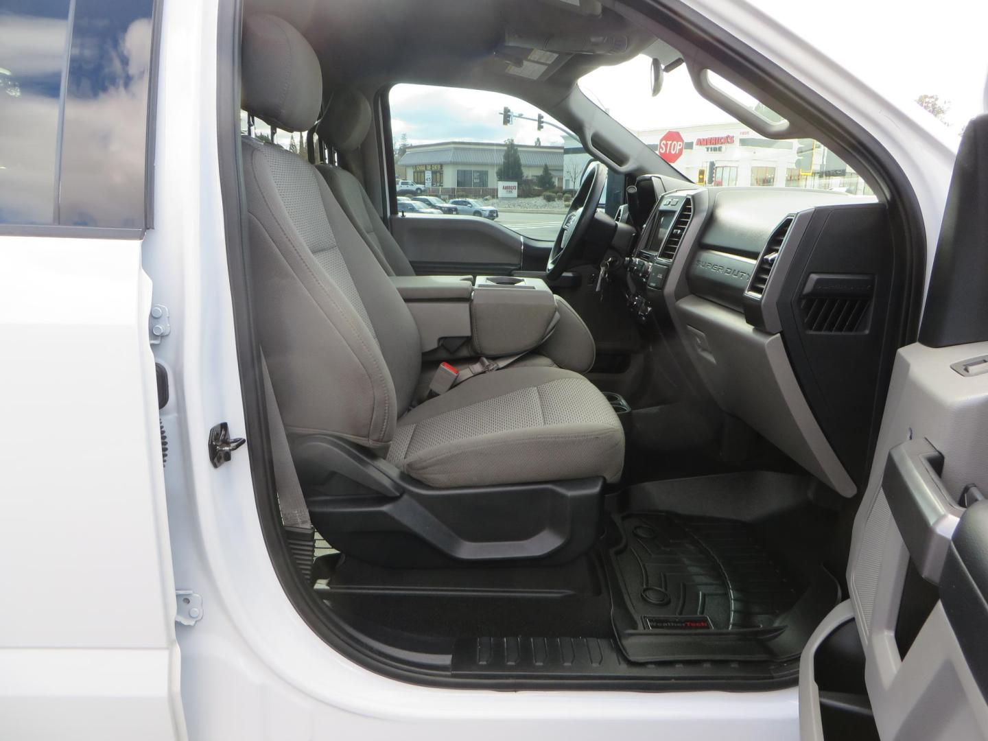 2019 White Ford F-250 SD XLT Crew Cab Short Bed 4WD (1FT7W2BT9KE) with an 6.7L V8 OHV 16V DIESEL engine, 6A transmission, located at 2630 Grass Valley Highway, Auburn, CA, 95603, (530) 508-5100, 38.937893, -121.095482 - Leveled XLT sitting on 22" SOTA Novakane wheels, 325 Nitto Ridge Grappler tires, Fox Shocks and dual steering stabilizers, Firestone Ride Rite air bags, Airlift wireless 1 air compressor, B and W Turnover gooseneck hitch, Weathertech floor liners, Deezee tailgate assist, and window tint. - Photo#52