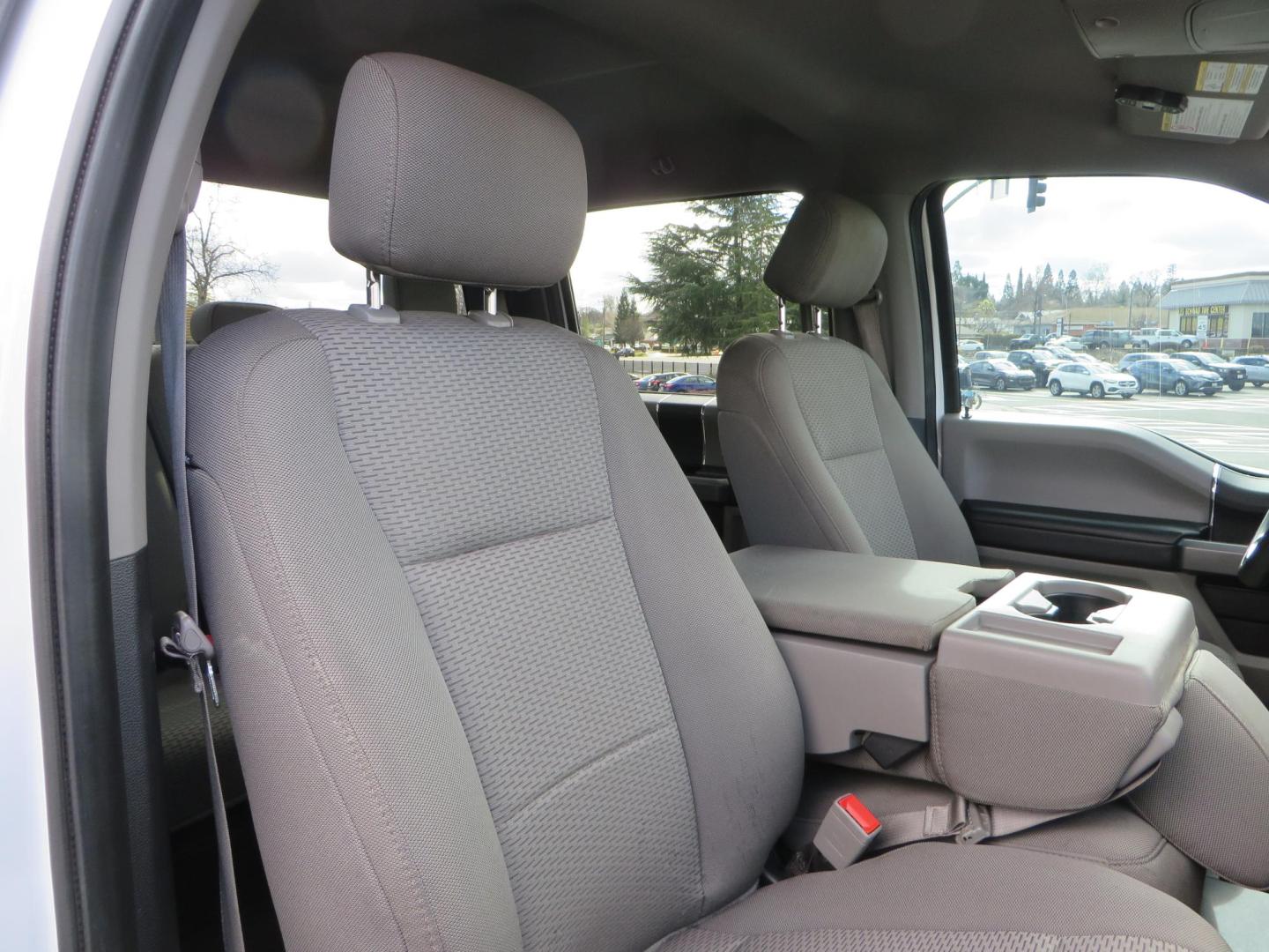 2019 White Ford F-250 SD XLT Crew Cab Short Bed 4WD (1FT7W2BT9KE) with an 6.7L V8 OHV 16V DIESEL engine, 6A transmission, located at 2630 Grass Valley Highway, Auburn, CA, 95603, (530) 508-5100, 38.937893, -121.095482 - Leveled XLT sitting on 22" SOTA Novakane wheels, 325 Nitto Ridge Grappler tires, Fox Shocks and dual steering stabilizers, Firestone Ride Rite air bags, Airlift wireless 1 air compressor, B and W Turnover gooseneck hitch, Weathertech floor liners, Deezee tailgate assist, and window tint. - Photo#54