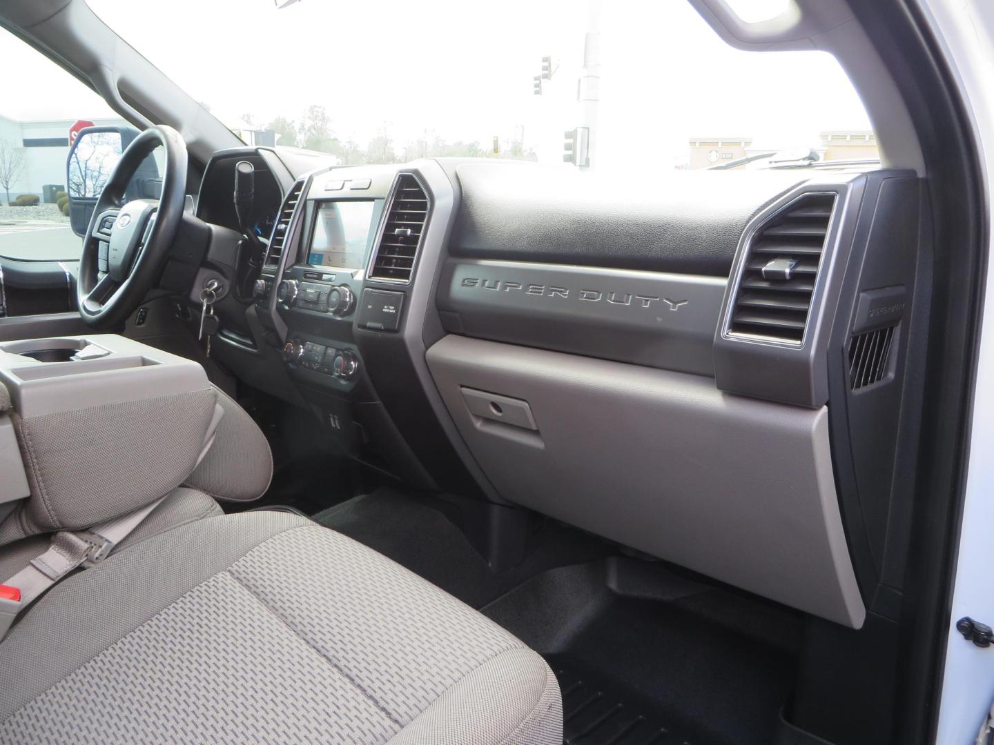 2019 White Ford F-250 SD XLT Crew Cab Short Bed 4WD (1FT7W2BT9KE) with an 6.7L V8 OHV 16V DIESEL engine, 6A transmission, located at 2630 Grass Valley Highway, Auburn, CA, 95603, (530) 508-5100, 38.937893, -121.095482 - Leveled XLT sitting on 22" SOTA Novakane wheels, 325 Nitto Ridge Grappler tires, Fox Shocks and dual steering stabilizers, Firestone Ride Rite air bags, Airlift wireless 1 air compressor, B and W Turnover gooseneck hitch, Weathertech floor liners, Deezee tailgate assist, and window tint. - Photo#55