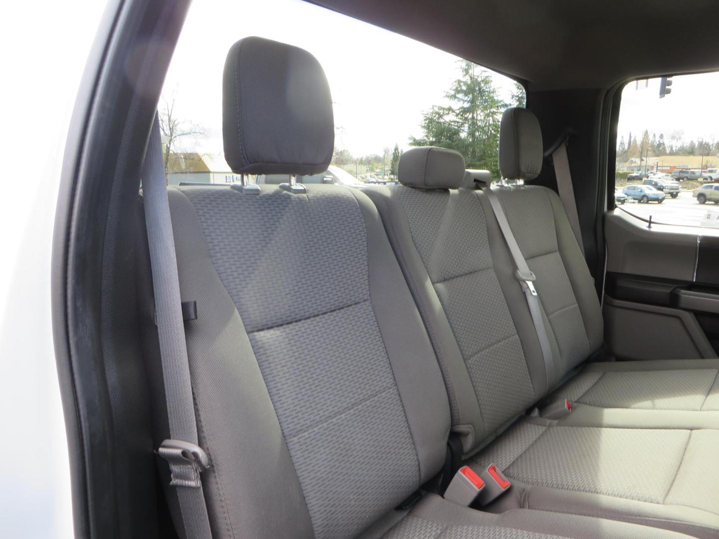 2019 White Ford F-250 SD XLT Crew Cab Short Bed 4WD (1FT7W2BT9KE) with an 6.7L V8 OHV 16V DIESEL engine, 6A transmission, located at 2630 Grass Valley Highway, Auburn, CA, 95603, (530) 508-5100, 38.937893, -121.095482 - Leveled XLT sitting on 22" SOTA Novakane wheels, 325 Nitto Ridge Grappler tires, Fox Shocks and dual steering stabilizers, Firestone Ride Rite air bags, Airlift wireless 1 air compressor, B and W Turnover gooseneck hitch, Weathertech floor liners, Deezee tailgate assist, and window tint. - Photo#59
