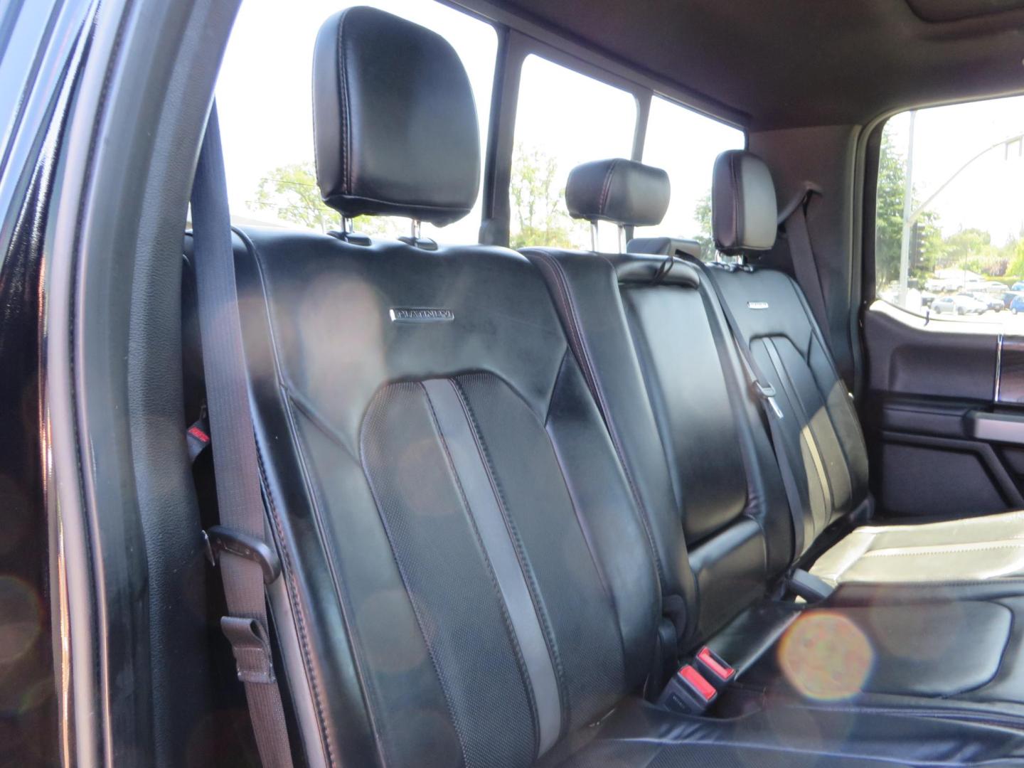 2019 BLACK Ford F-250 SD Platinum Crew Cab Short Bed 4WD (1FT7W2BTXKE) with an 6.7L V8 OHV 16V DIESEL engine, 6A transmission, located at 2630 Grass Valley Highway, Auburn, CA, 95603, (530) 508-5100, 38.937893, -121.095482 - Featuring a 6" Pro Comp Suspension system, Fox shocks and dual steering stabilizers, 38" Falken Wildpeak tires, 20" LRG wheels, Window tint, and painted Ford badges. - Photo#60