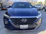 2019 Stormy BLue /Black Hyundai Santa Fe SEL 2.4 (5NMS33AD0KH) with an 2.4L L4 DOHC 16V engine, 8A transmission, located at 30 S. Berkeley Avenue, Pasadena, CA, 91107, (626) 248-7567, 34.145447, -118.109398 - Are you in the market for a stylish, reliable, and family-friendly SUV? Look no further than this 2019 Hyundai Santa Fe, available now at Crown City Motors, located at 30 S Berkeley Ave, Pasadena, CA 91107. As a premier Buy Here Pay Here dealership in Pasadena, we’re proud to offer this exceptiona - Photo#17
