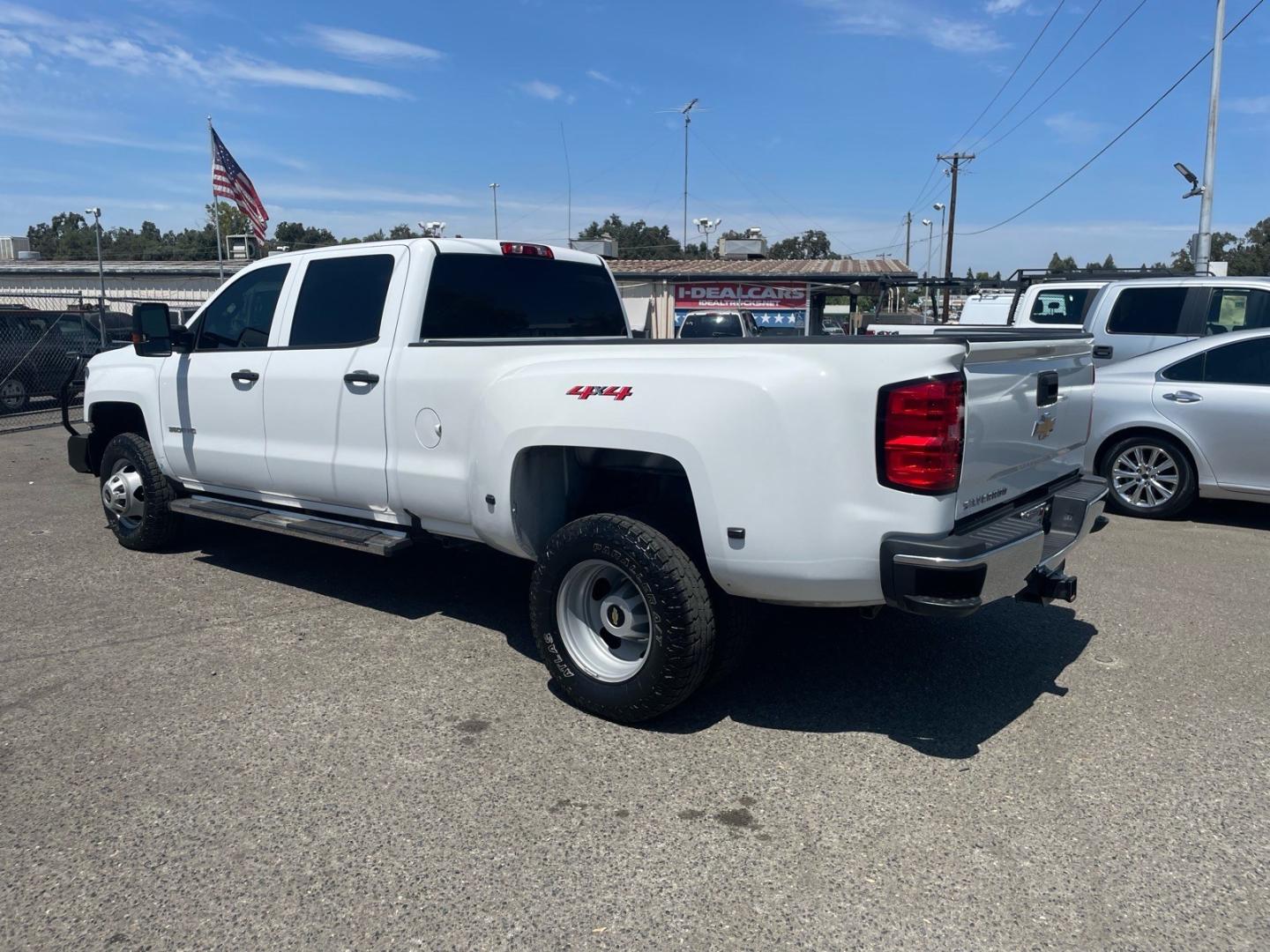 2019 Summit White Chevrolet Silverado 3500HD Work Truck (1GC4KVCY0KF) with an 6.6L Duramax 6.6L Biodiesel Turbo V8 445hp 910ft. lbs. Common Rail Direct Injection engine, Allison 1000 6-Speed Shiftable Automatic transmission, located at 800 Riverside Ave, Roseville, CA, 95678, 916-773-4549 & Toll Free: 866-719-4393, 38.732265, -121.291039 - DURAMAX DIESEL CREW CAB DUALLY 4X4 DIESEL ALLISON TRANSMISSION SERVICE RECORDS ON CLEAN CARFAX- Photo#3