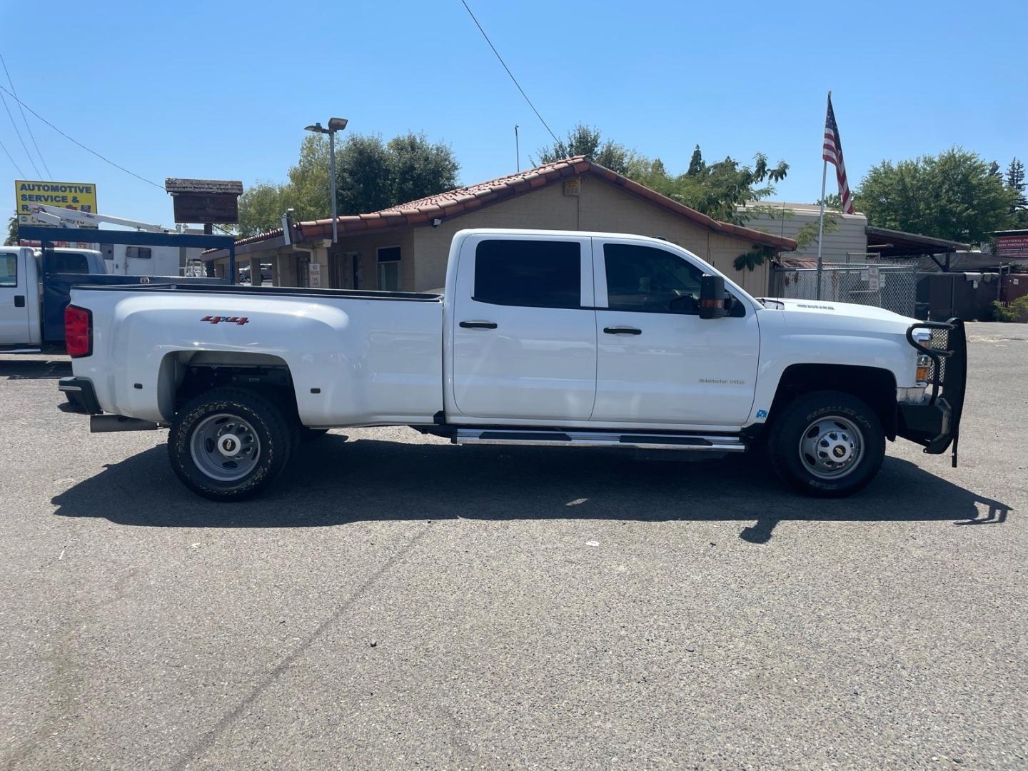 2019 Summit White Chevrolet Silverado 3500HD Work Truck (1GC4KVCY0KF) with an 6.6L Duramax 6.6L Biodiesel Turbo V8 445hp 910ft. lbs. Common Rail Direct Injection engine, Allison 1000 6-Speed Shiftable Automatic transmission, located at 800 Riverside Ave, Roseville, CA, 95678, 916-773-4549 & Toll Free: 866-719-4393, 38.732265, -121.291039 - DURAMAX DIESEL CREW CAB DUALLY 4X4 DIESEL ALLISON TRANSMISSION SERVICE RECORDS ON CLEAN CARFAX- Photo#6