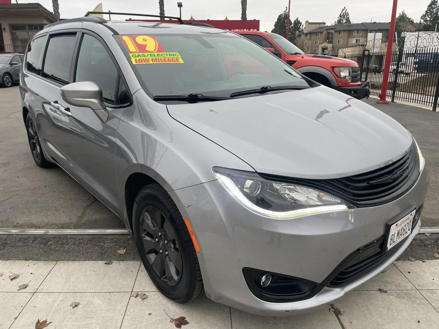2019 Chrysler Pacifica Hybrid Touring L (2C4RC1L79KR) with an 3.6L V6 DOHC 24V HYBRID engine, CVT transmission, located at 744 E Miner Ave, Stockton, CA, 95202, (209) 944-5770, 37.956863, -121.282082 - PLUS TAXES AND FEES - Photo#0