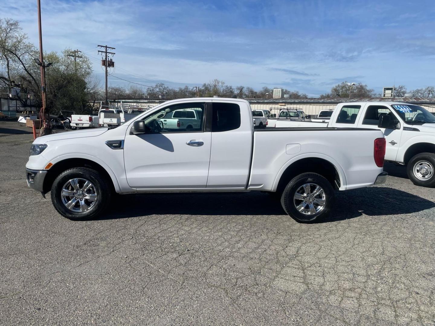 2019 Oxford White Ford Ranger XLT (1FTER1EH5KL) with an 2.3L EcoBoost 2.3L Turbo I4 270hp 310ft. lbs. Direct Injection engine, 10-Speed Shiftable Automatic transmission, located at 800 Riverside Ave, Roseville, CA, 95678, 916-773-4549 & Toll Free: 866-719-4393, 38.732265, -121.291039 - SUPER CAB ECOBOOST SERVICE RECORDS ON CLEAN CARFAX- Photo#1