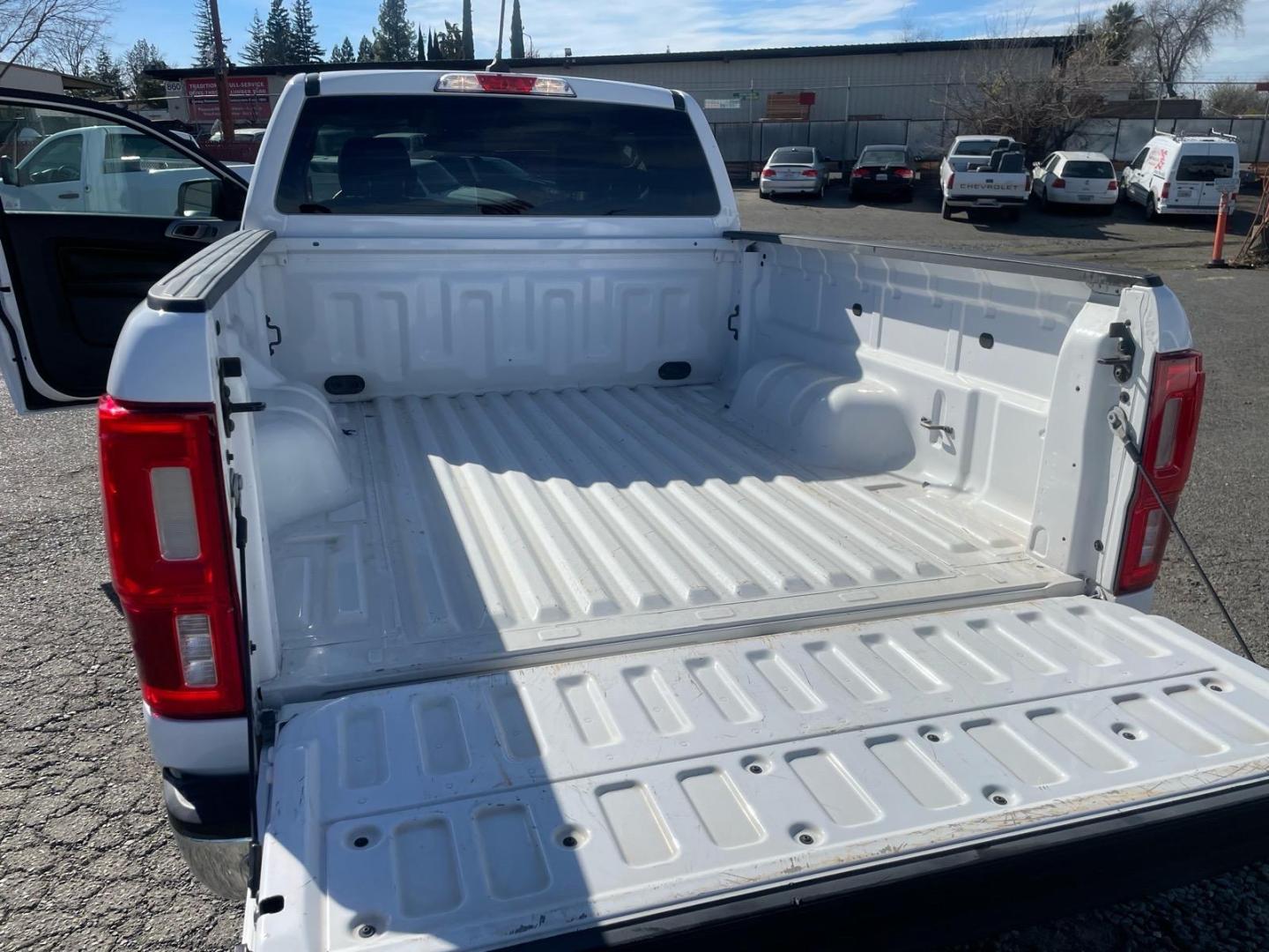 2019 Oxford White Ford Ranger XLT (1FTER1EH5KL) with an 2.3L EcoBoost 2.3L Turbo I4 270hp 310ft. lbs. Direct Injection engine, 10-Speed Shiftable Automatic transmission, located at 800 Riverside Ave, Roseville, CA, 95678, 916-773-4549 & Toll Free: 866-719-4393, 38.732265, -121.291039 - SUPER CAB ECOBOOST SERVICE RECORDS ON CLEAN CARFAX- Photo#14