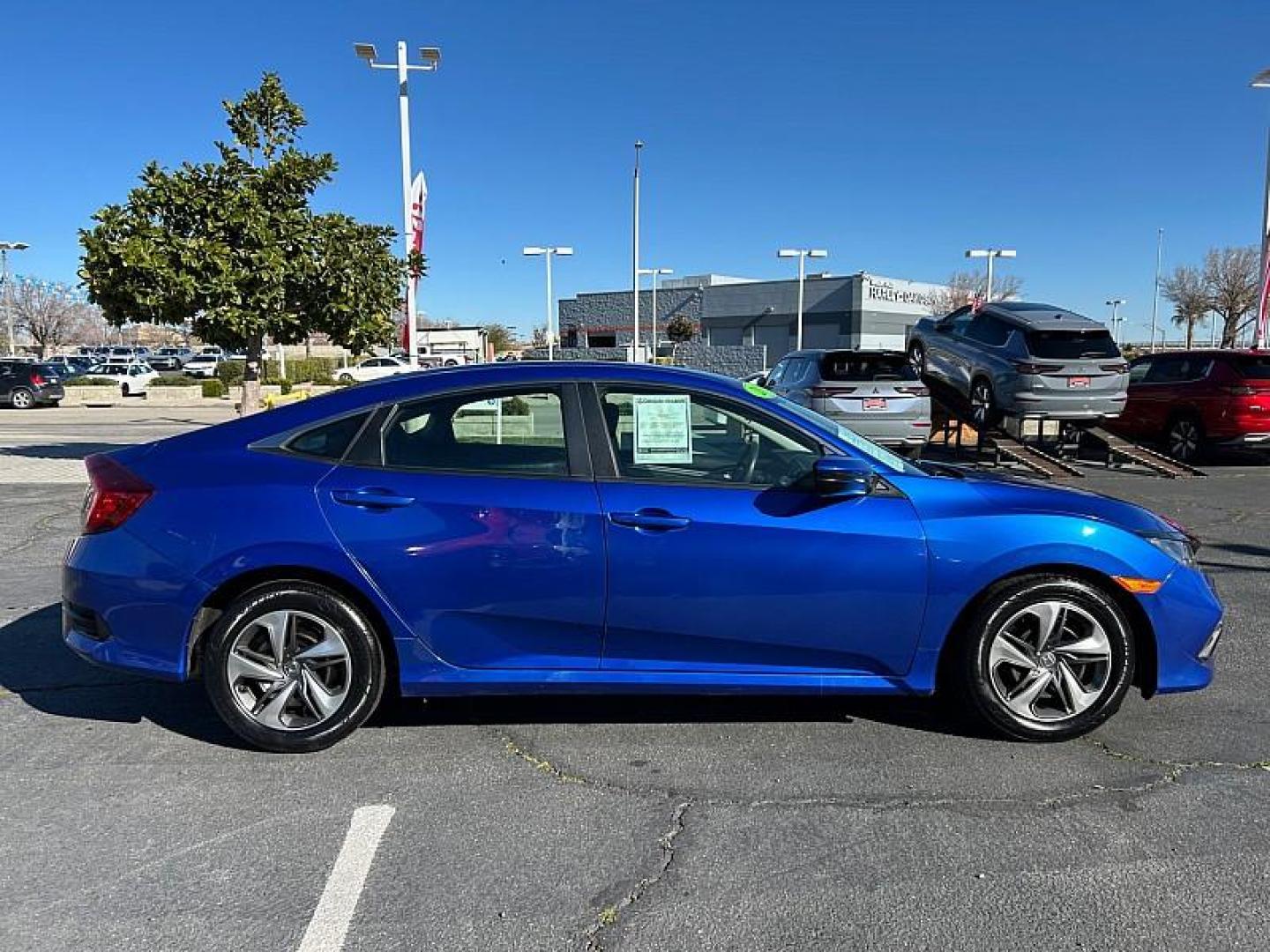 2019 BLUE Honda Civic Sedan (2HGFC2F64KH) with an 4-Cyl 2 Liter engine, Automatic CVT transmission, located at 412 Auto Vista Drive, Palmdale, 93551, (661) 945-0620, 34.592636, -118.136681 - Photo#2