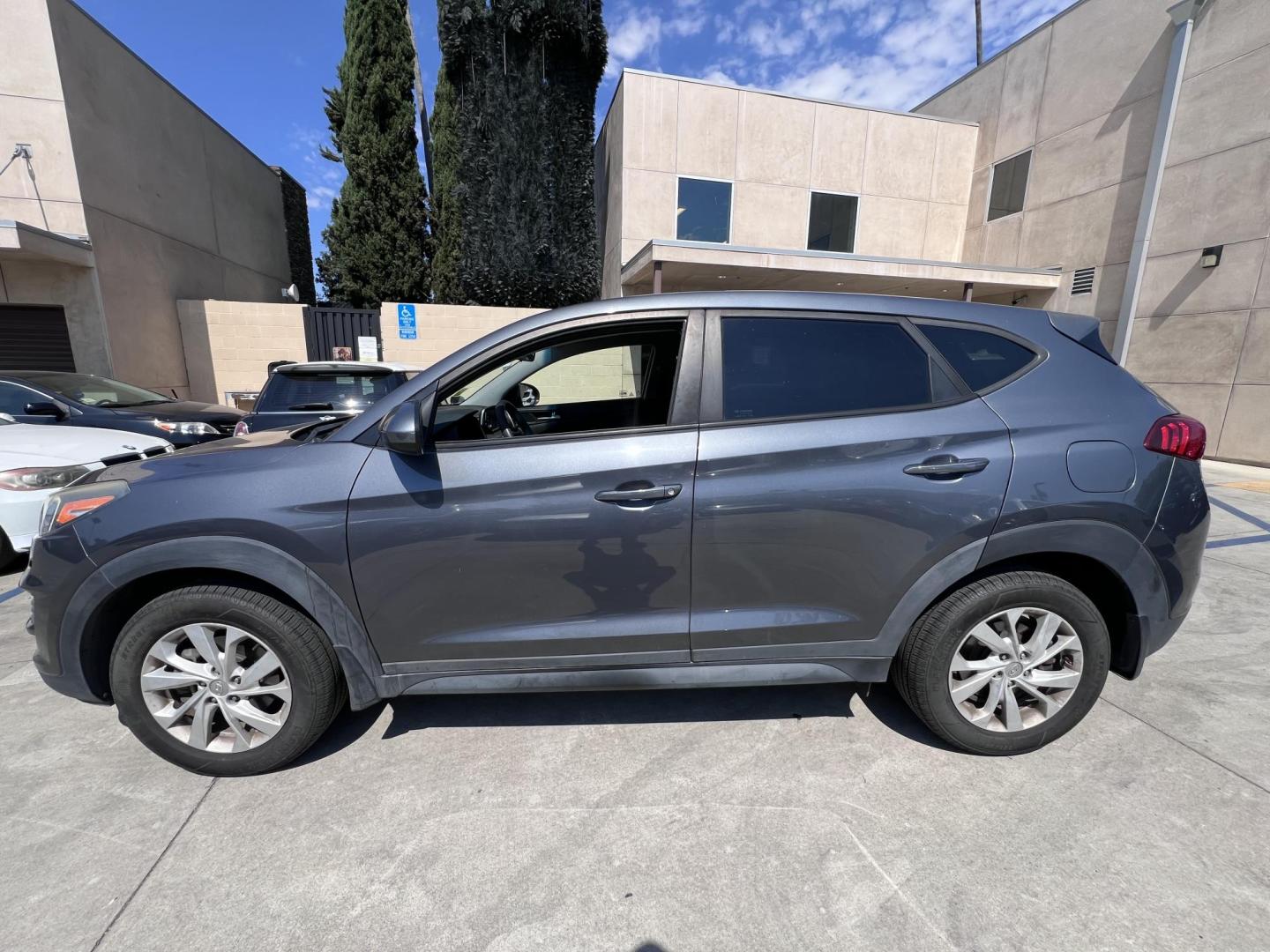 2019 Coliseum Gray /Black Hyundai Tucson SE (KM8J23A48KU) with an 2.0L L4 DOHC 16V engine, 6A transmission, located at 30 S. Berkeley Avenue, Pasadena, CA, 91107, (626) 248-7567, 34.145447, -118.109398 - ? 2019 Hyundai Tucson SE – Affordable, Reliable, and BHPH Friendly! VIN: KM8J23A48KU859863 Offered By: Crown City Motors, Pasadena, CA Financing Options: Buy Here Pay Here | No Credit Check | $500 Down OAC Looking for a dependable SUV with modern features, great gas mileage, and flexible fin - Photo#1