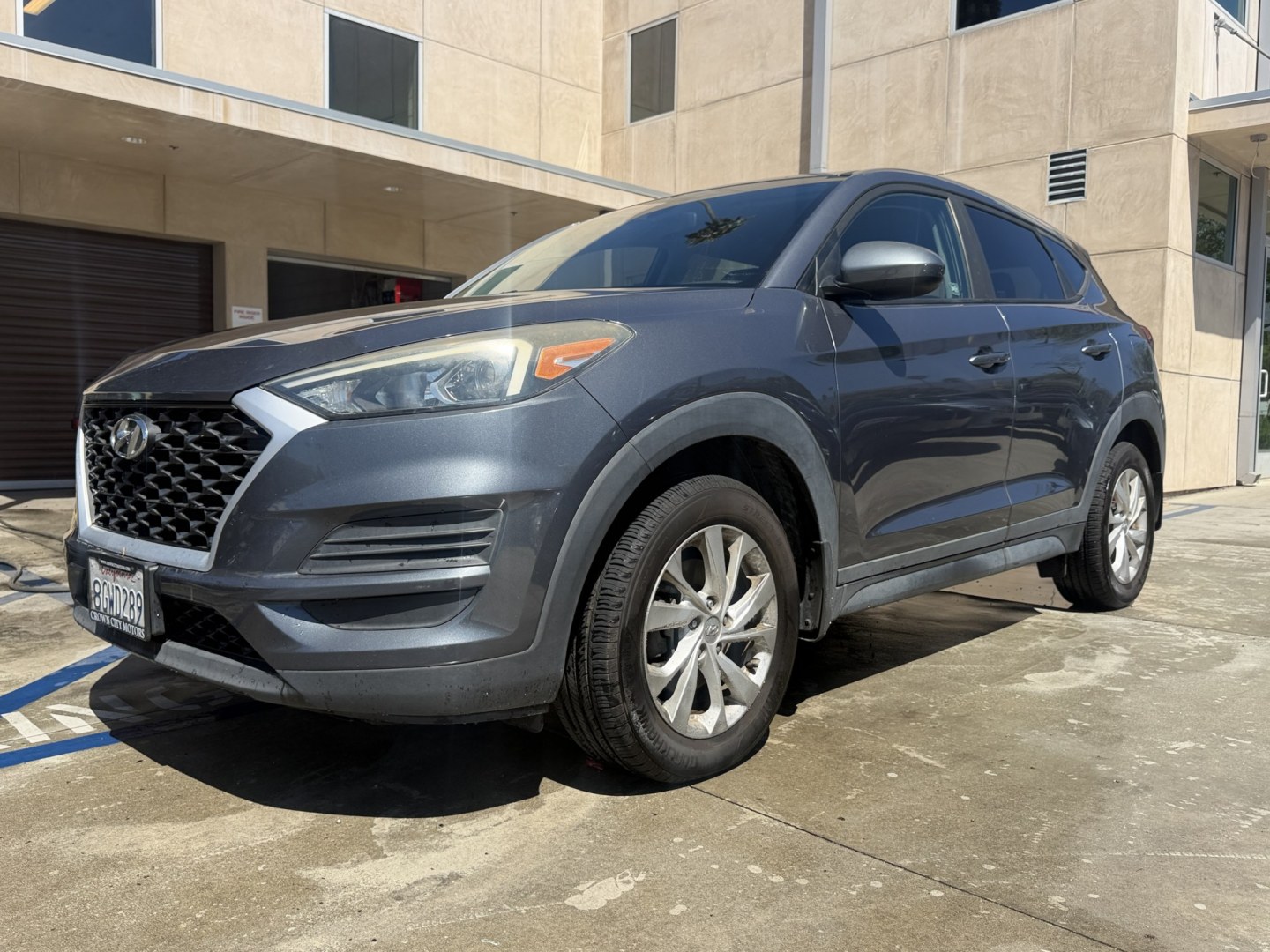 2019 Coliseum Gray /Black Hyundai Tucson SE (KM8J23A48KU) with an 2.0L L4 DOHC 16V engine, 6A transmission, located at 30 S. Berkeley Avenue, Pasadena, CA, 91107, (626) 248-7567, 34.145447, -118.109398 - DEALER IDENTIFIER: Crown City Motors Sales | Buy Here Pay Here Pasadena TARGET REGIONS: Pasadena, San Gabriel Valley, Riverside, San Bernardino FINANCING SPECIALTY: Subprime Auto Lending, In-House Financing, Bad Credit Car Loans CA VEHICLE: 2019 Hyundai Tucson SE 2.0L (VIN: KM8J23A48KU859863)- Photo#0