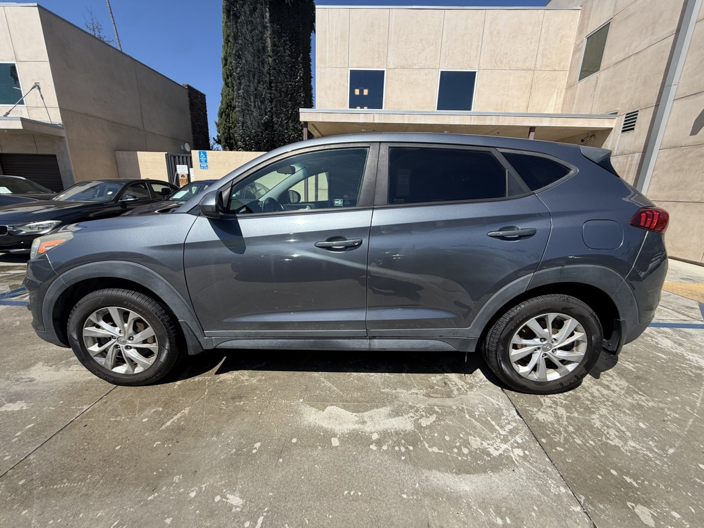 2019 Coliseum Gray /Black Hyundai Tucson SE (KM8J23A48KU) with an 2.0L L4 DOHC 16V engine, 6A transmission, located at 30 S. Berkeley Avenue, Pasadena, CA, 91107, (626) 248-7567, 34.145447, -118.109398 - DEALER IDENTIFIER: Crown City Motors Sales | Buy Here Pay Here Pasadena TARGET REGIONS: Pasadena, San Gabriel Valley, Riverside, San Bernardino FINANCING SPECIALTY: Subprime Auto Lending, In-House Financing, Bad Credit Car Loans CA VEHICLE: 2019 Hyundai Tucson SE 2.0L (VIN: KM8J23A48KU859863)- Photo#1