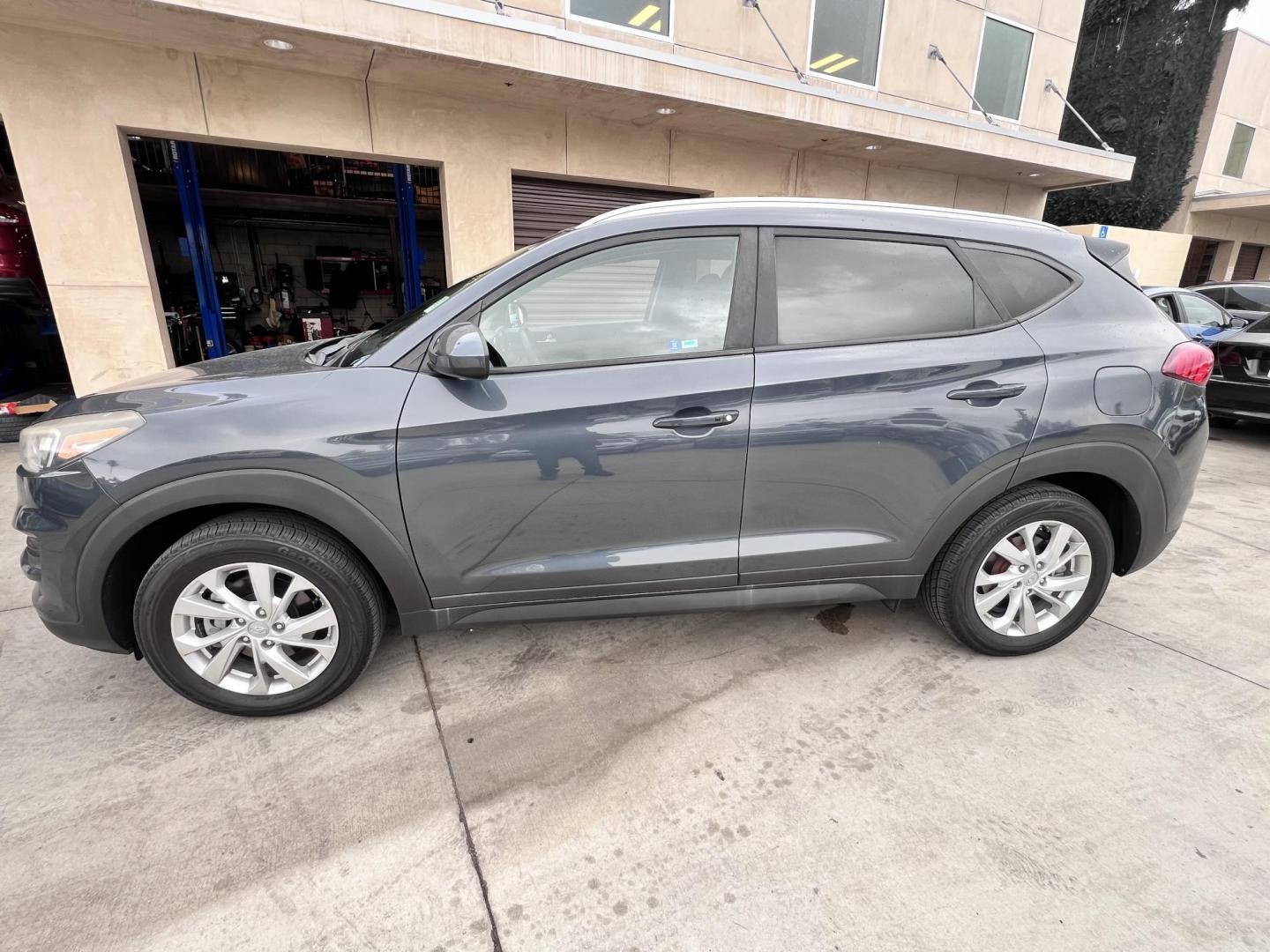 2019 Gray /BLACK Hyundai Tucson SEL (KM8J33A4XKU) with an 2.0L L4 DOHC 16V engine, 6A transmission, located at 30 S. Berkeley Avenue, Pasadena, CA, 91107, (626) 248-7567, 34.145447, -118.109398 - Crown City Motors is a used “Buy Here Pay Here” car dealer in Pasadena CA. “Buy Here Pay Here” financing, means that when you purchase your vehicle from our dealership, that you make the payments to the dealership as well. We do not need the banks approval to get you approved for a used auto - Photo#1
