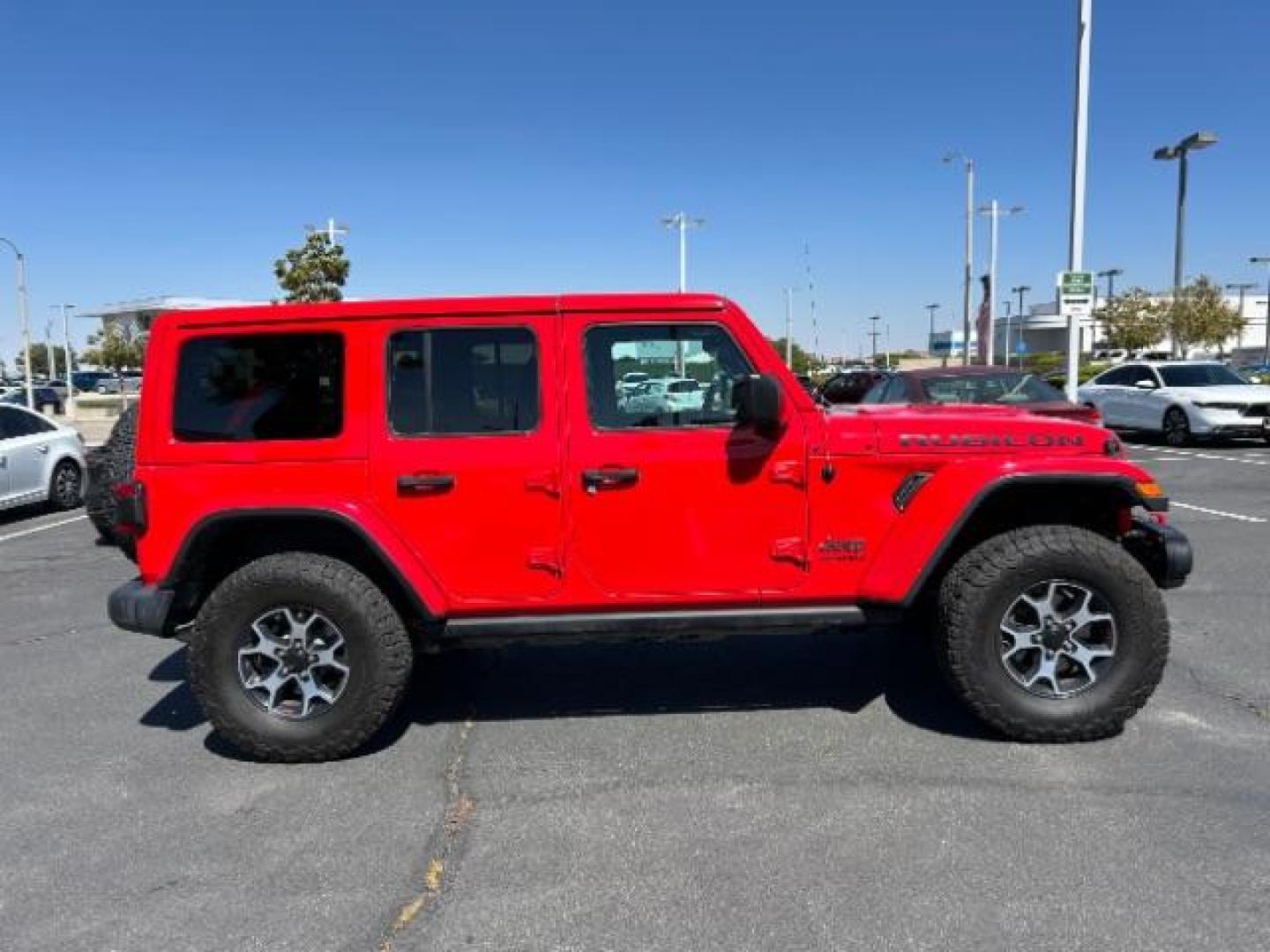 2019 RED Jeep Wrangler Unlimited (1C4HJXFG6KW) with an 6-Cyl 3.6 Liter engine, Automatic transmission, located at 412 Auto Vista Drive, Palmdale, 93551, (661) 945-0620, 34.592636, -118.136681 - Photo#5