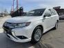2019 Mitsubishi Outlander PHEV GT (JA4J24A50KZ) with an 2.0L L4 DOHC 16V HYBRID engine, 1A transmission, located at 744 E Miner Ave, Stockton, CA, 95202, (209) 944-5770, 37.956863, -121.282082 - Photo#3