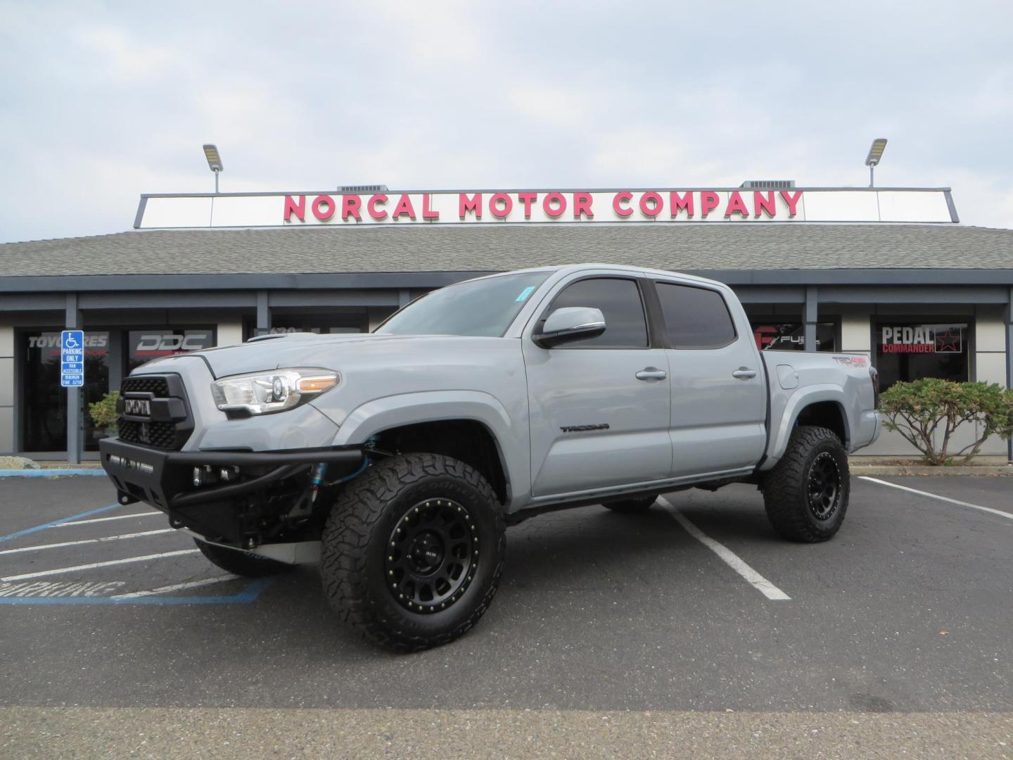 2019 grey /black Toyota Tacoma TRD Sport Double Cab (3TMCZ5AN2KM) with an 3.6L V6 DOHC 24V engine, 6A transmission, located at 2630 Grass Valley Highway, Auburn, CA, 95603, (530) 508-5100, 38.937893, -121.095482 - Must see Tacoma sitting on King 2.5 adjustable remote reservoir coilovers, King 2.5 adjustable remote reservoir rear shocks, Icon Upper control arms, BFG KO3 tires, 17" Method NV wheels, C4 front bumper, Baja Designs lights, LUXX series taillights, aluminum TRD skid plate, bedmat, bed extender, and - Photo#0