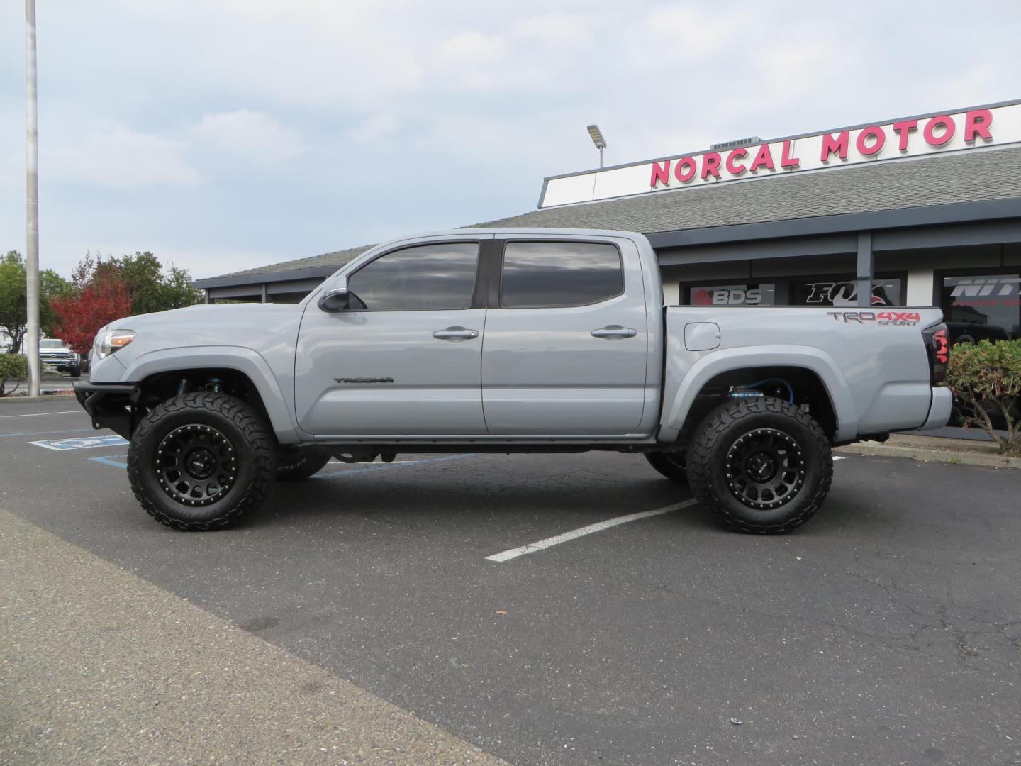 2019 grey /black Toyota Tacoma TRD Sport Double Cab (3TMCZ5AN2KM) with an 3.6L V6 DOHC 24V engine, 6A transmission, located at 2630 Grass Valley Highway, Auburn, CA, 95603, (530) 508-5100, 38.937893, -121.095482 - Must see Tacoma sitting on King 2.5 adjustable remote reservoir coilovers, King 2.5 adjustable remote reservoir rear shocks, Icon Upper control arms, BFG KO3 tires, 17" Method NV wheels, C4 front bumper, Baja Designs lights, LUXX series taillights, aluminum TRD skid plate, bedmat, bed extender, and - Photo#1