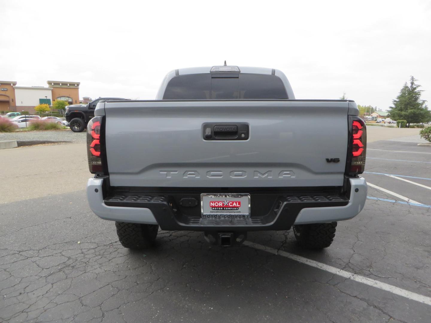 2019 grey /black Toyota Tacoma TRD Sport Double Cab (3TMCZ5AN2KM) with an 3.6L V6 DOHC 24V engine, 6A transmission, located at 2630 Grass Valley Highway, Auburn, CA, 95603, (530) 508-5100, 38.937893, -121.095482 - Must see Tacoma sitting on King 2.5 adjustable remote reservoir coilovers, King 2.5 adjustable remote reservoir rear shocks, Icon Upper control arms, BFG KO3 tires, 17" Method NV wheels, C4 front bumper, Baja Designs lights, LUXX series taillights, aluminum TRD skid plate, bedmat, bed extender, and - Photo#3