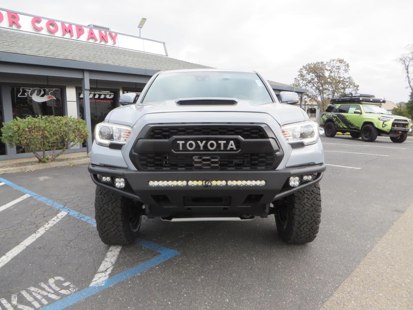 2019 grey /black Toyota Tacoma TRD Sport Double Cab (3TMCZ5AN2KM) with an 3.6L V6 DOHC 24V engine, 6A transmission, located at 2630 Grass Valley Highway, Auburn, CA, 95603, (530) 508-5100, 38.937893, -121.095482 - Must see Tacoma sitting on King 2.5 adjustable remote reservoir coilovers, King 2.5 adjustable remote reservoir rear shocks, Icon Upper control arms, BFG KO3 tires, 17" Method NV wheels, C4 front bumper, Baja Designs lights, LUXX series taillights, aluminum TRD skid plate, bedmat, bed extender, and - Photo#7