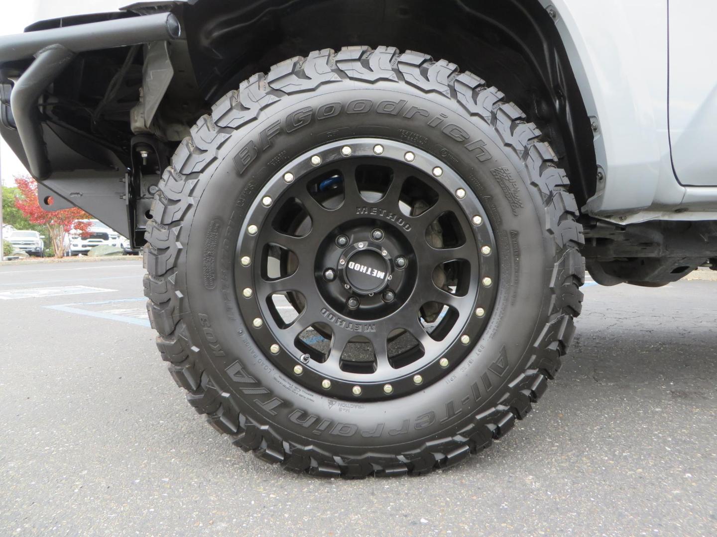 2019 grey /black Toyota Tacoma TRD Sport Double Cab (3TMCZ5AN2KM) with an 3.6L V6 DOHC 24V engine, 6A transmission, located at 2630 Grass Valley Highway, Auburn, CA, 95603, (530) 508-5100, 38.937893, -121.095482 - Must see Tacoma sitting on King 2.5 adjustable remote reservoir coilovers, King 2.5 adjustable remote reservoir rear shocks, Icon Upper control arms, BFG KO3 tires, 17" Method NV wheels, C4 front bumper, Baja Designs lights, LUXX series taillights, aluminum TRD skid plate, bedmat, bed extender, and - Photo#8