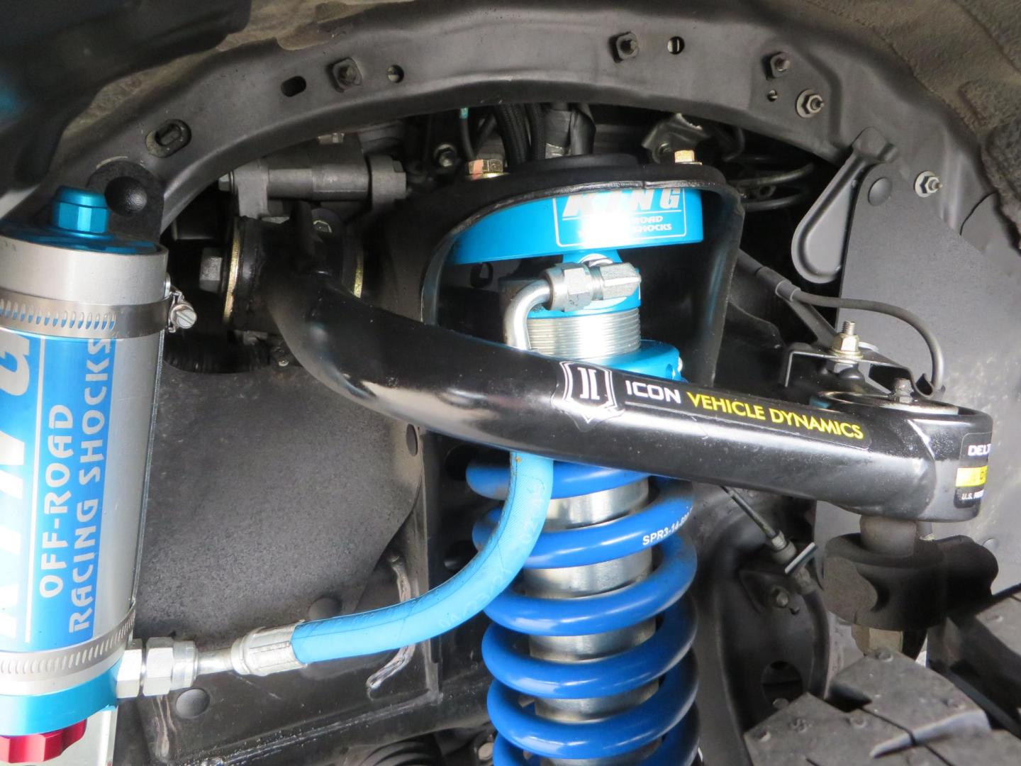 2019 grey /black Toyota Tacoma TRD Sport Double Cab (3TMCZ5AN2KM) with an 3.6L V6 DOHC 24V engine, 6A transmission, located at 2630 Grass Valley Highway, Auburn, CA, 95603, (530) 508-5100, 38.937893, -121.095482 - Must see Tacoma sitting on King 2.5 adjustable remote reservoir coilovers, King 2.5 adjustable remote reservoir rear shocks, Icon Upper control arms, BFG KO3 tires, 17" Method NV wheels, C4 front bumper, Baja Designs lights, LUXX series taillights, aluminum TRD skid plate, bedmat, bed extender, and - Photo#10