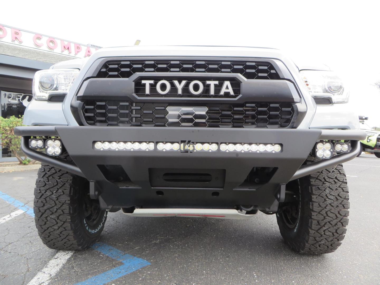 2019 grey /black Toyota Tacoma TRD Sport Double Cab (3TMCZ5AN2KM) with an 3.6L V6 DOHC 24V engine, 6A transmission, located at 2630 Grass Valley Highway, Auburn, CA, 95603, (530) 508-5100, 38.937893, -121.095482 - Must see Tacoma sitting on King 2.5 adjustable remote reservoir coilovers, King 2.5 adjustable remote reservoir rear shocks, Icon Upper control arms, BFG KO3 tires, 17" Method NV wheels, C4 front bumper, Baja Designs lights, LUXX series taillights, aluminum TRD skid plate, bedmat, bed extender, and - Photo#13