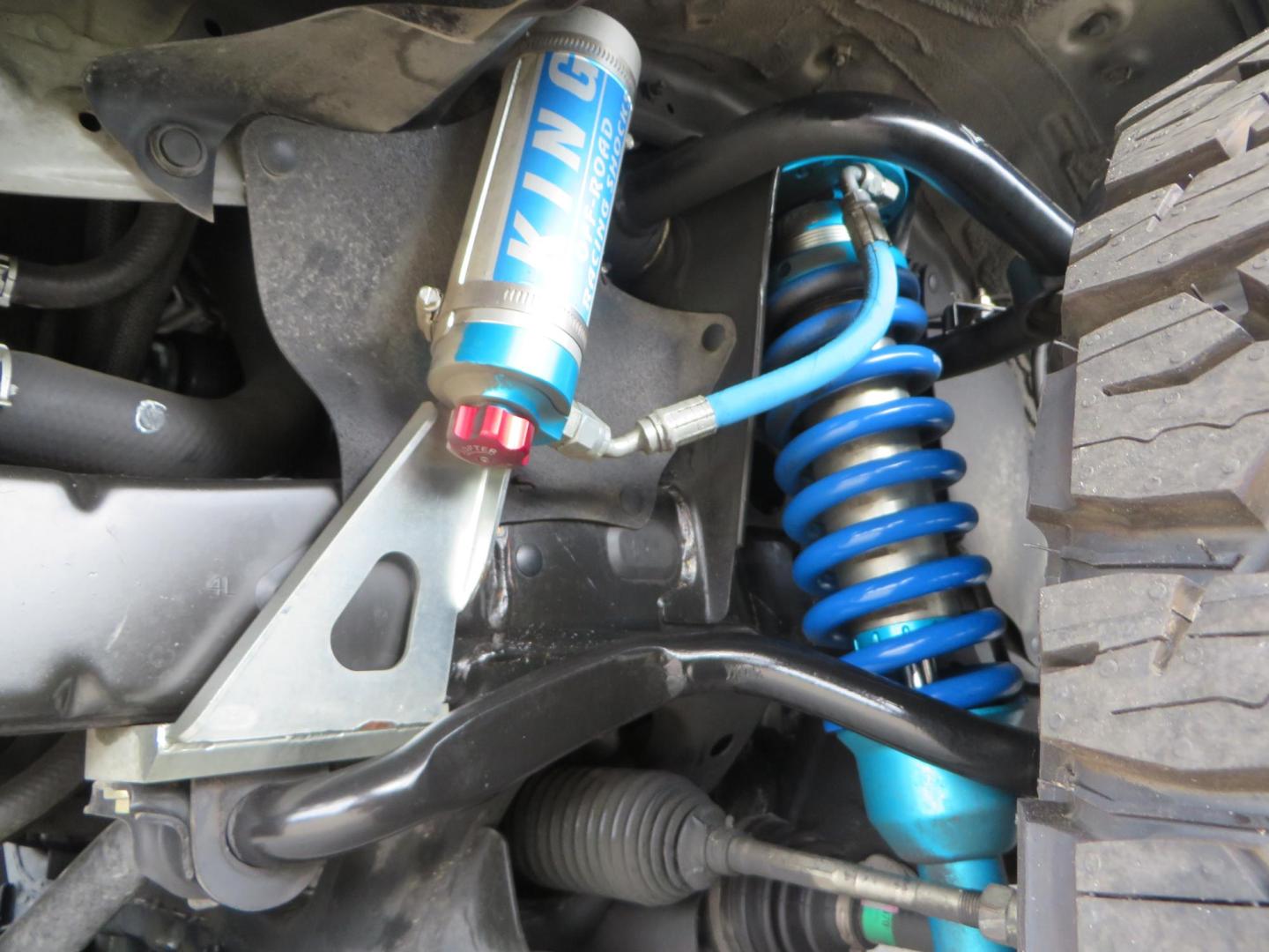 2019 grey /black Toyota Tacoma TRD Sport Double Cab (3TMCZ5AN2KM) with an 3.6L V6 DOHC 24V engine, 6A transmission, located at 2630 Grass Valley Highway, Auburn, CA, 95603, (530) 508-5100, 38.937893, -121.095482 - Must see Tacoma sitting on King 2.5 adjustable remote reservoir coilovers, King 2.5 adjustable remote reservoir rear shocks, Icon Upper control arms, BFG KO3 tires, 17" Method NV wheels, C4 front bumper, Baja Designs lights, LUXX series taillights, aluminum TRD skid plate, bedmat, bed extender, and - Photo#11