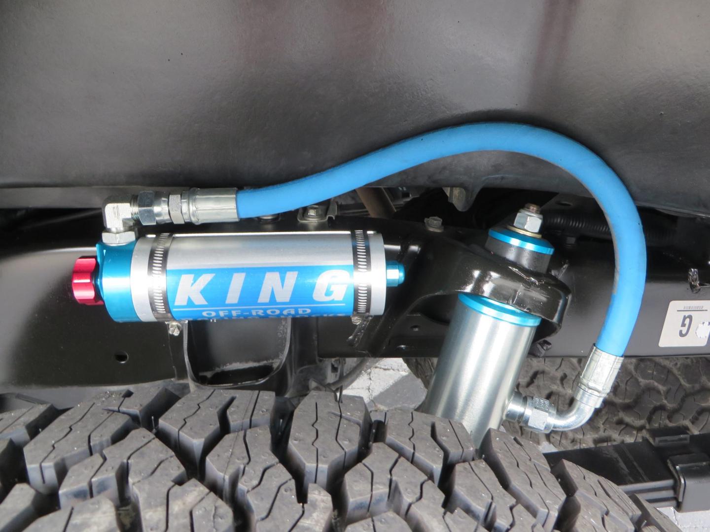 2019 grey /black Toyota Tacoma TRD Sport Double Cab (3TMCZ5AN2KM) with an 3.6L V6 DOHC 24V engine, 6A transmission, located at 2630 Grass Valley Highway, Auburn, CA, 95603, (530) 508-5100, 38.937893, -121.095482 - Must see Tacoma sitting on King 2.5 adjustable remote reservoir coilovers, King 2.5 adjustable remote reservoir rear shocks, Icon Upper control arms, BFG KO3 tires, 17" Method NV wheels, C4 front bumper, Baja Designs lights, LUXX series taillights, aluminum TRD skid plate, bedmat, bed extender, and - Photo#12