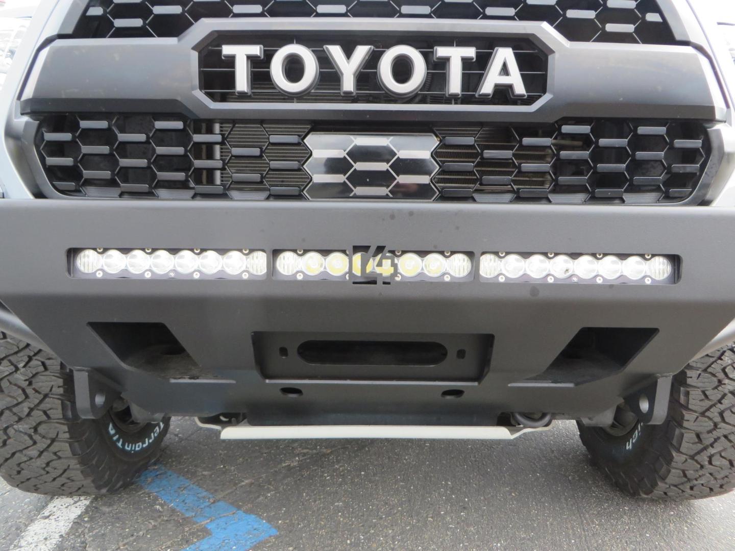 2019 grey /black Toyota Tacoma TRD Sport Double Cab (3TMCZ5AN2KM) with an 3.6L V6 DOHC 24V engine, 6A transmission, located at 2630 Grass Valley Highway, Auburn, CA, 95603, (530) 508-5100, 38.937893, -121.095482 - Must see Tacoma sitting on King 2.5 adjustable remote reservoir coilovers, King 2.5 adjustable remote reservoir rear shocks, Icon Upper control arms, BFG KO3 tires, 17" Method NV wheels, C4 front bumper, Baja Designs lights, LUXX series taillights, aluminum TRD skid plate, bedmat, bed extender, and - Photo#14